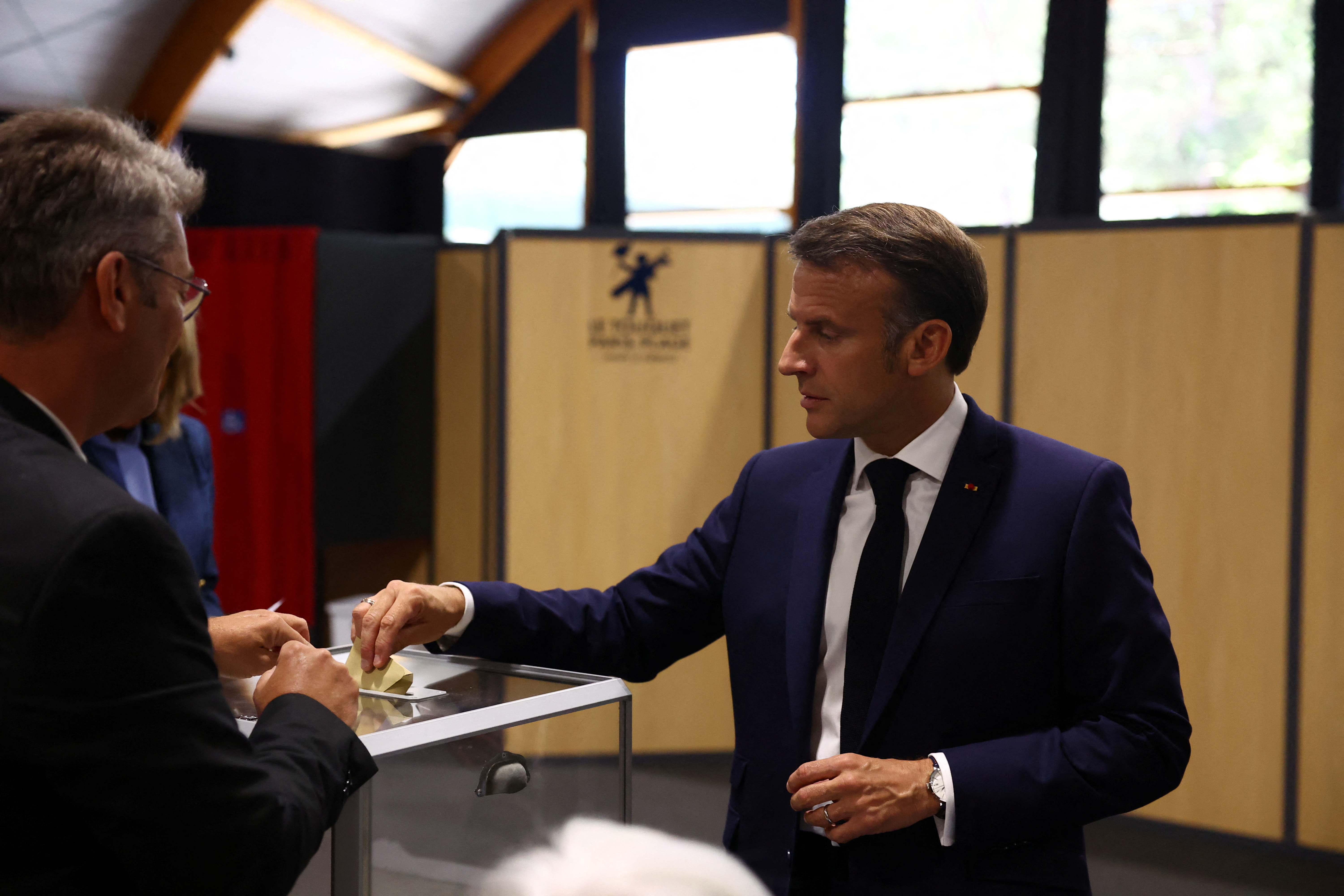 French President Macron votes during the European Parliament elections, in Le Touquet-Paris-Plage