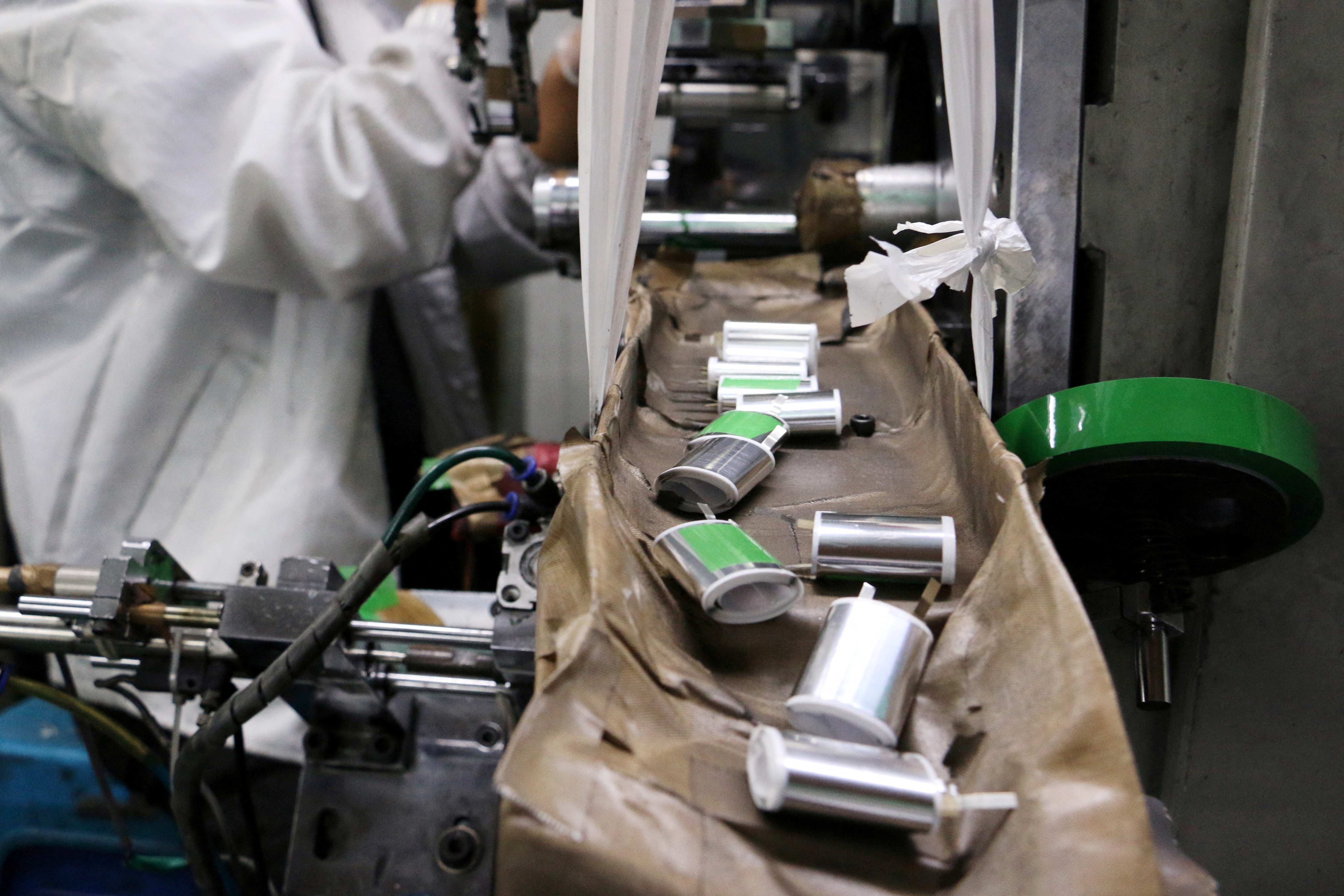 Lithium ion batteries are seen on a production line inside a factory in Dongguan