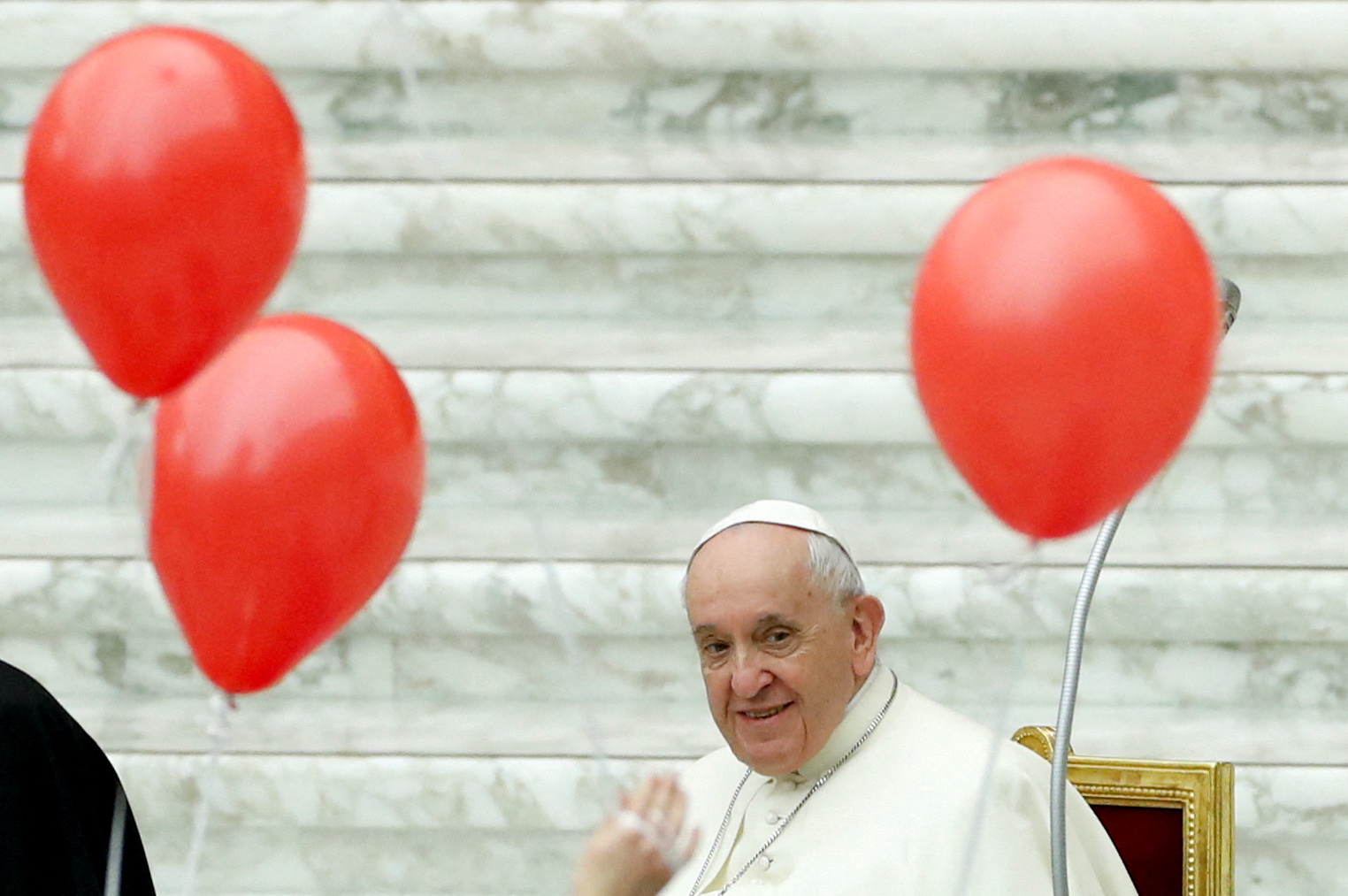 Pope Francis meets children assisted by Santa Marta institute volunteers, at the Vatican