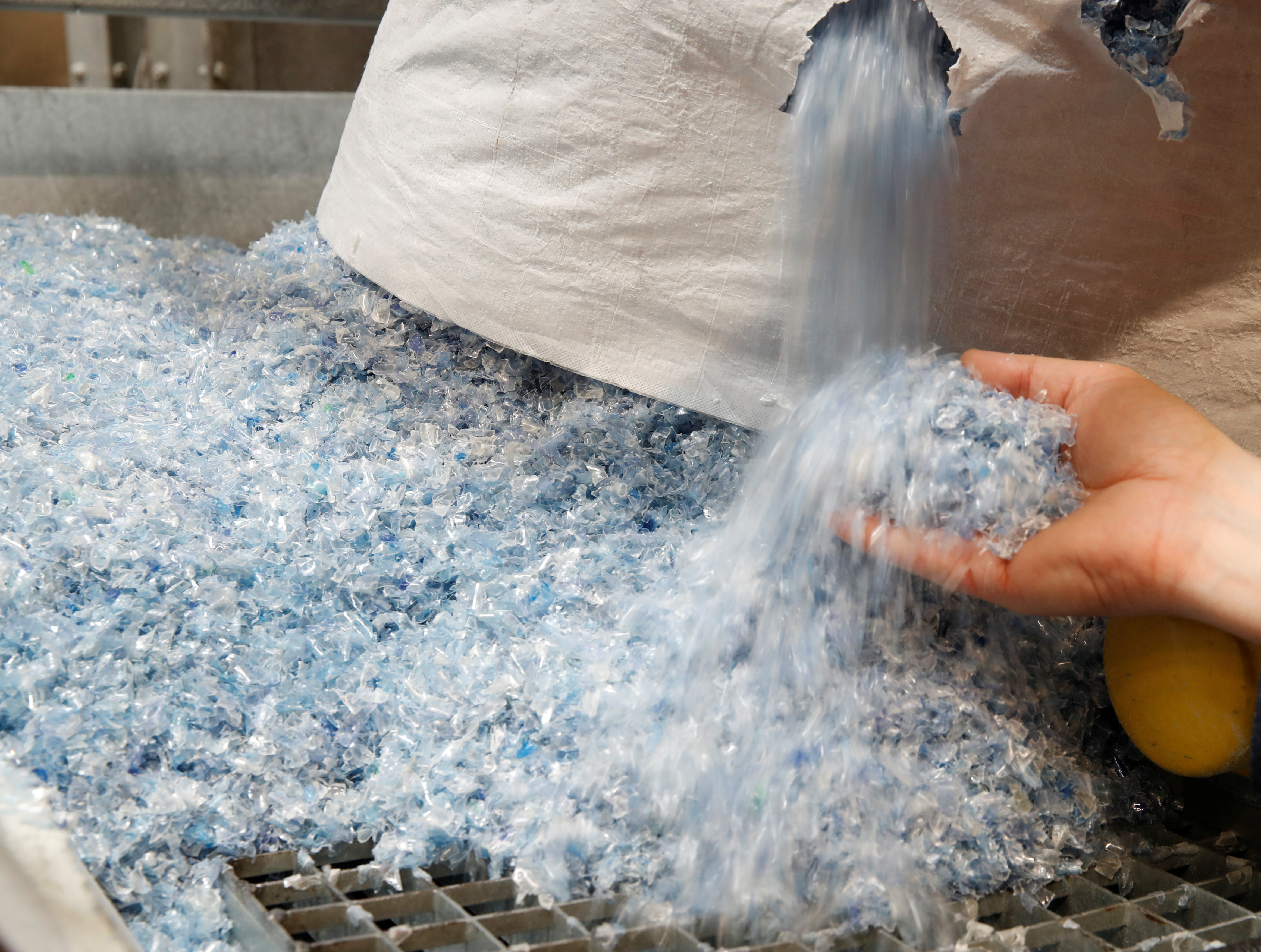 Flakes of bottles made from PET (polyethylene terephthalate) plastic at Poly Recycling AG in Bilten