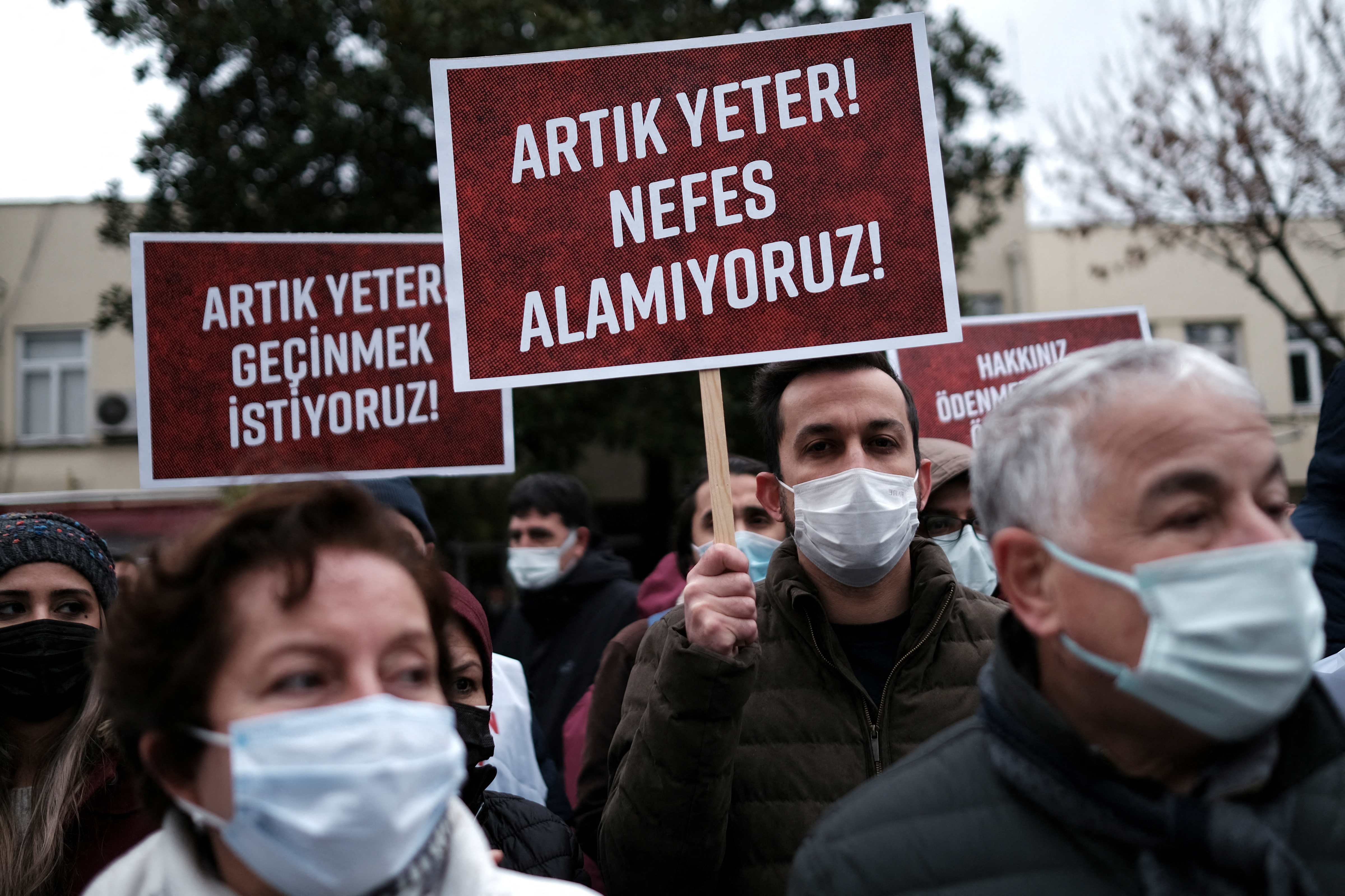 Medical workers take part in a protest against poor wages and harsh working conditions amid a currency meltdown, in Istanbul