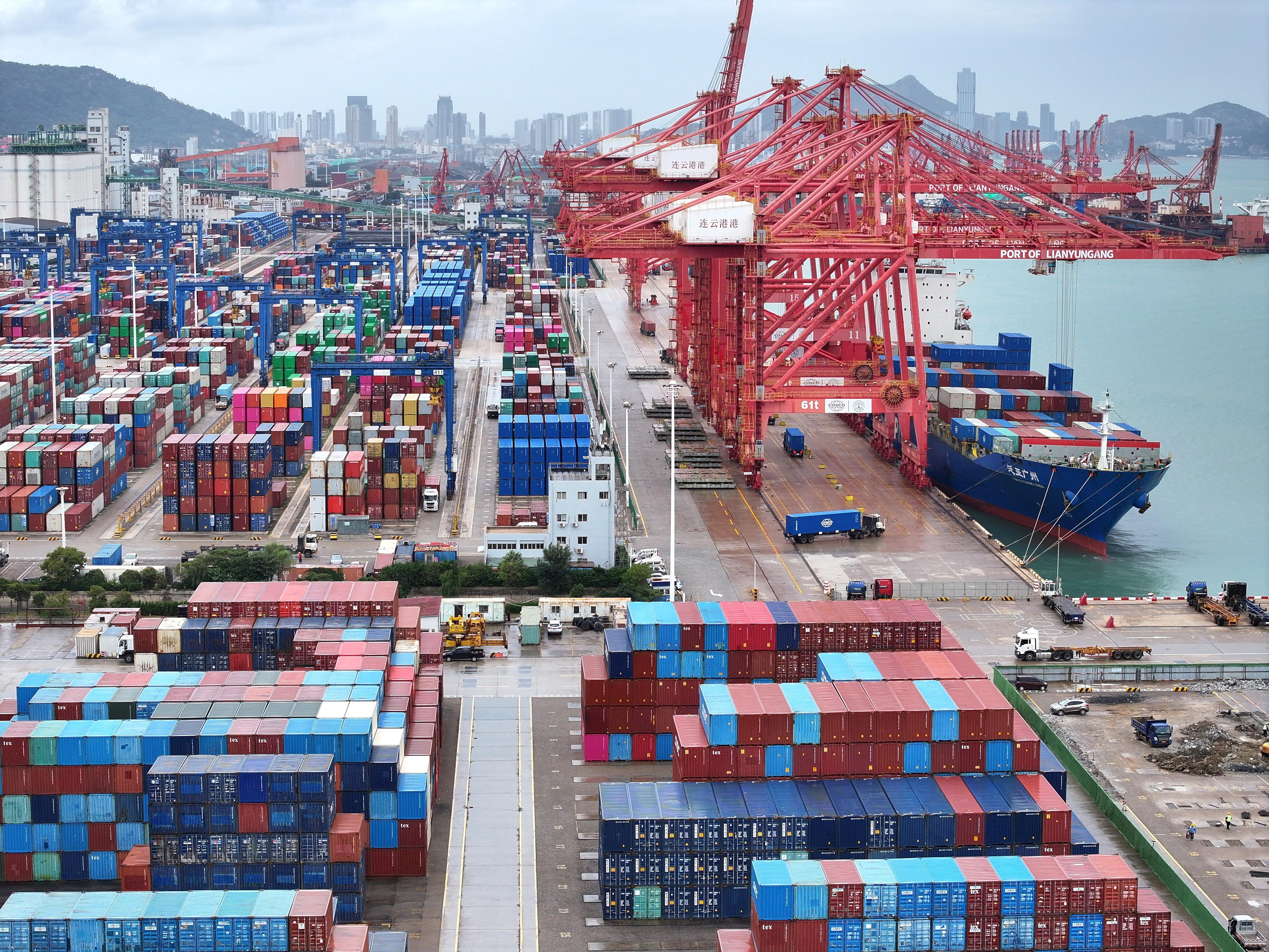 Drone view shows a cargo ship and shipping containers at the port of Lianyungang