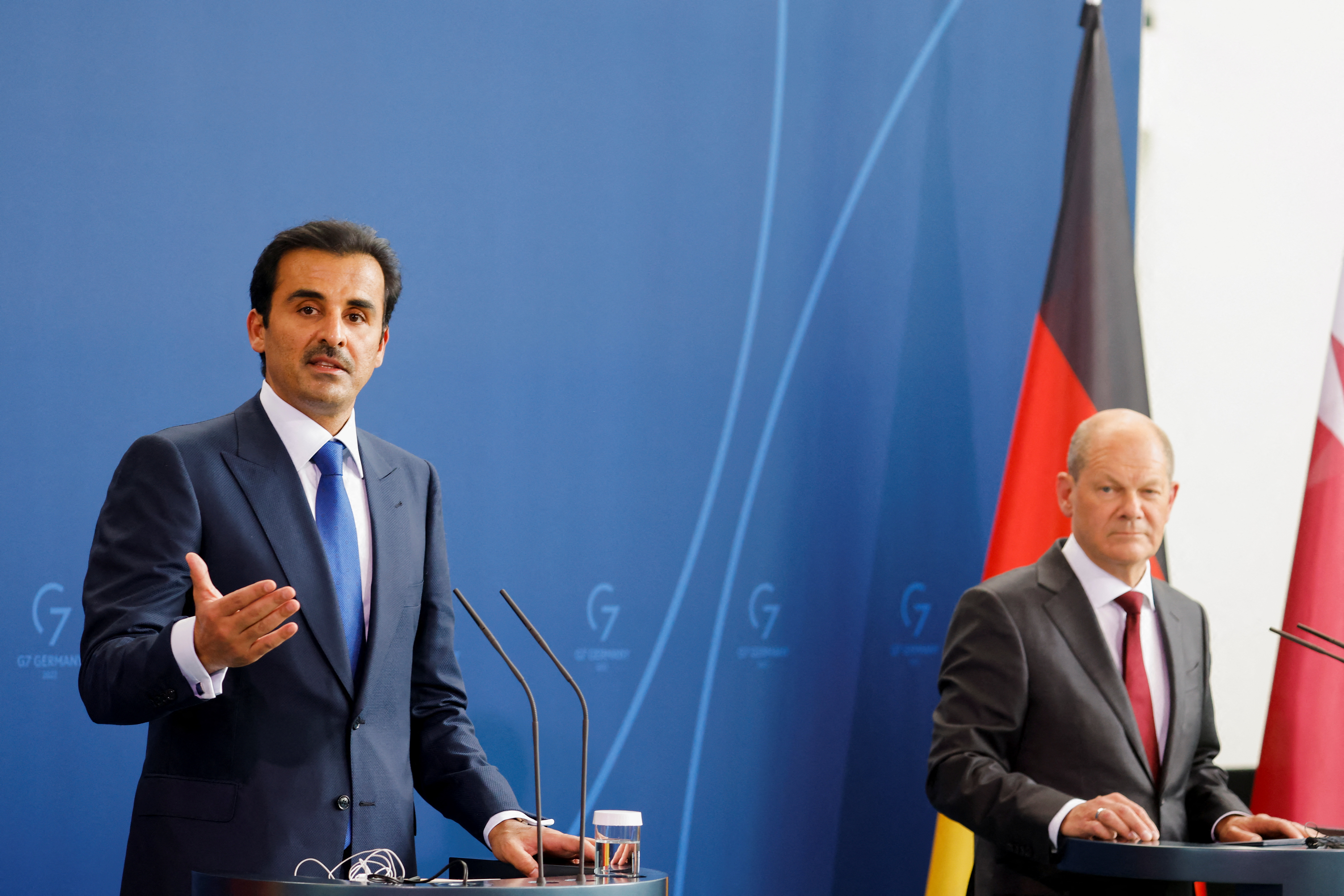 German Chancellor Scholz and Qatar's Emir Sheikh Tamim bin Hamad al-Thani attend news conference, in Berlin