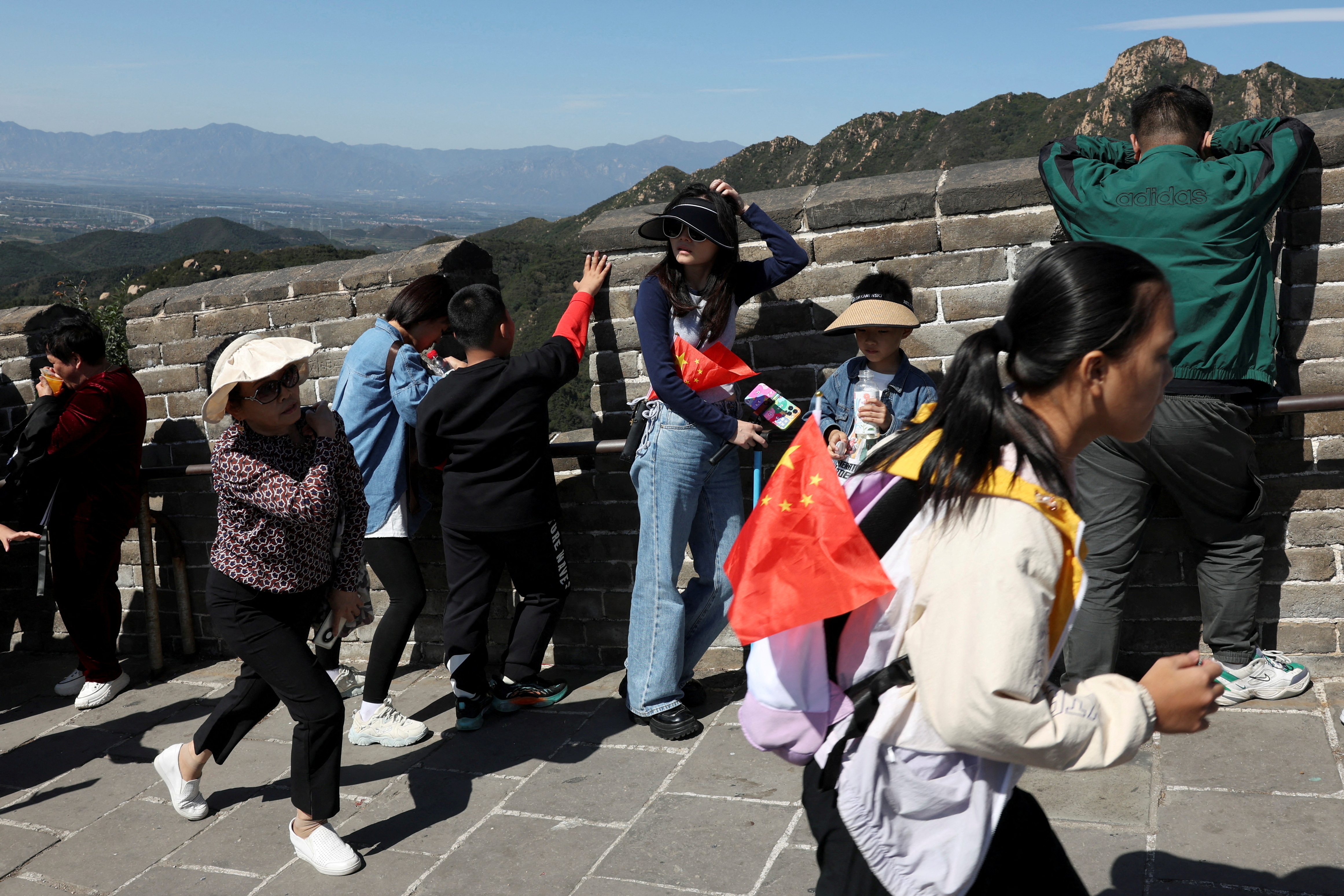 Cost conscious Chinese tourists look to affordable options for Golden Week holiday Reuters