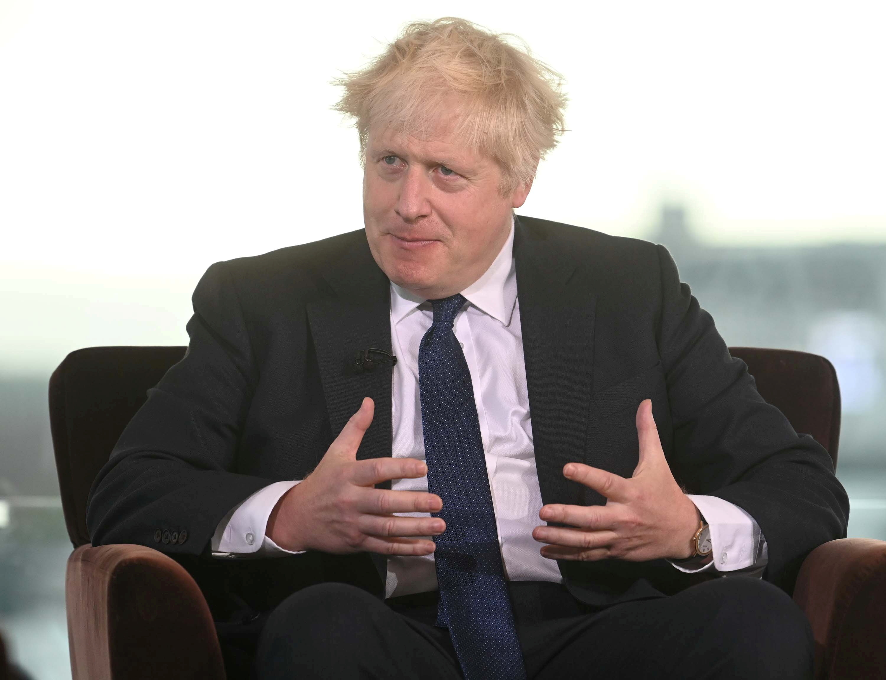 Britian's Prime Minister Boris Johnson appears as a guest on the Andrew Marr Show at the BBC Broadcasting House in Manchester, Britain October 3, 2021. Jeff Overs/BBC/Handout via REUTERS 