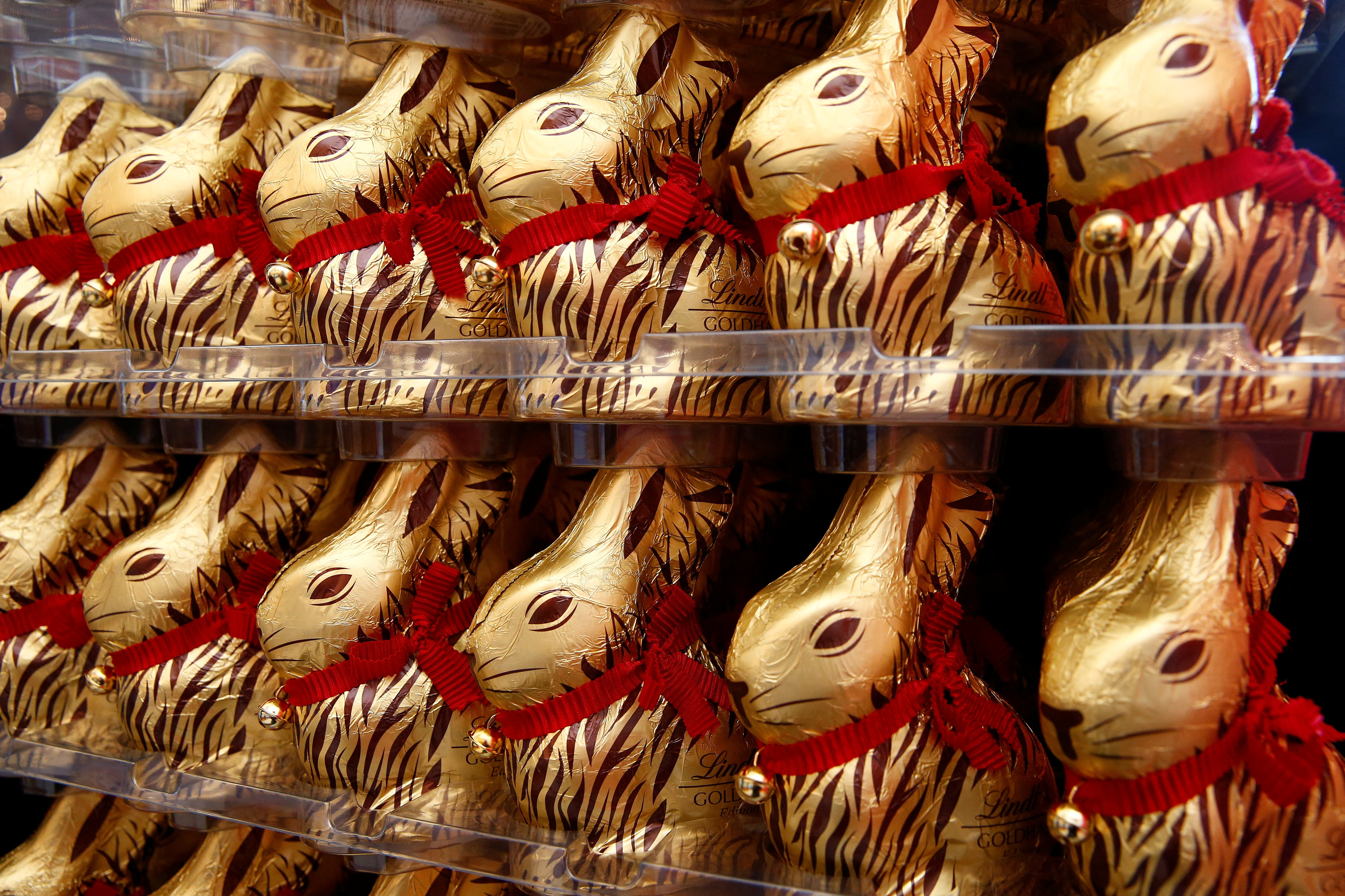 Gold-wrapped Easter chocolate bunnies are displayed during the annual news conference of Swiss chocolatier Lindt & Spruengli in Kilchberg