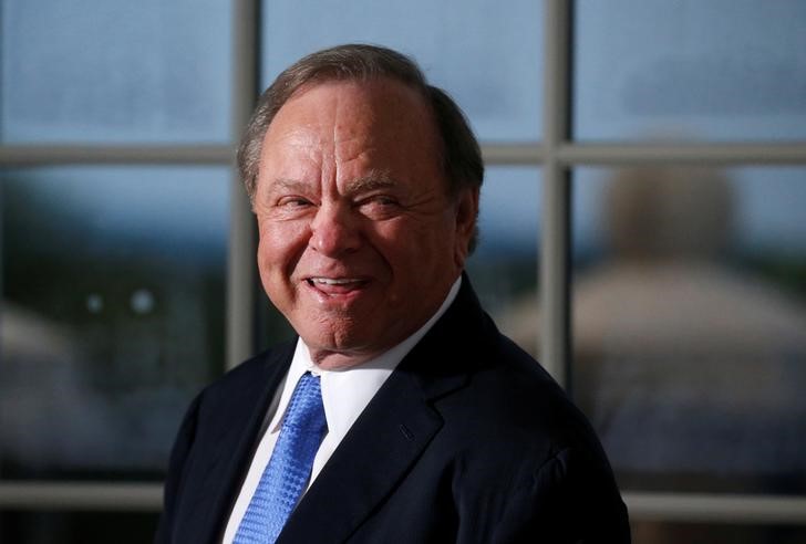 Harold Hamm of Continental Resources introduces himself at a dinner for business leaders hosted by U.S. President Donald Trump at Trump National Golf Club in Bedminster