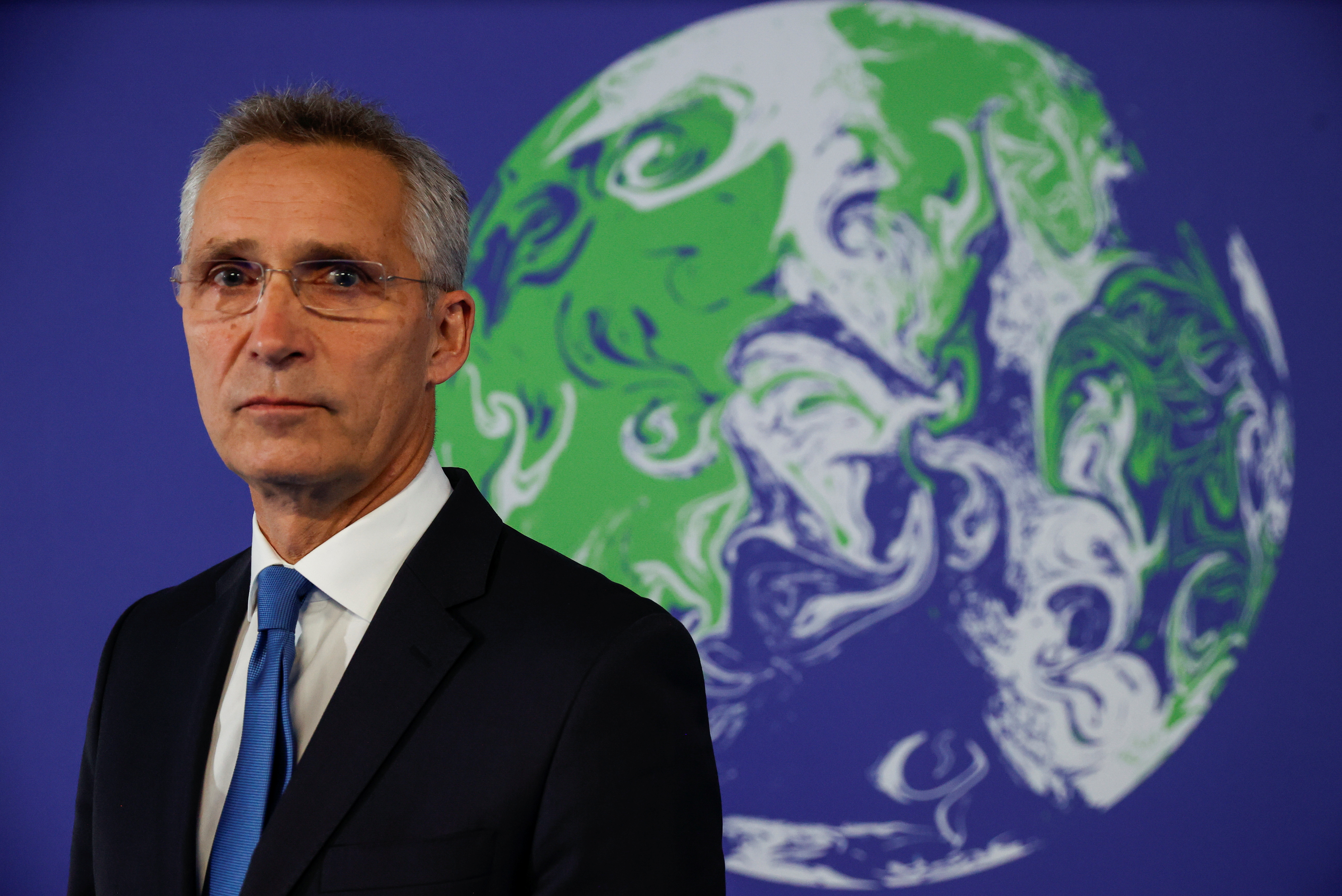 NATO Secretary General Jens Stoltenberg poses for a picture during the UN Climate Change Conference (COP26) in Glasgow, Scotland, Britain, November 2, 2021. REUTERS/Phil Noble