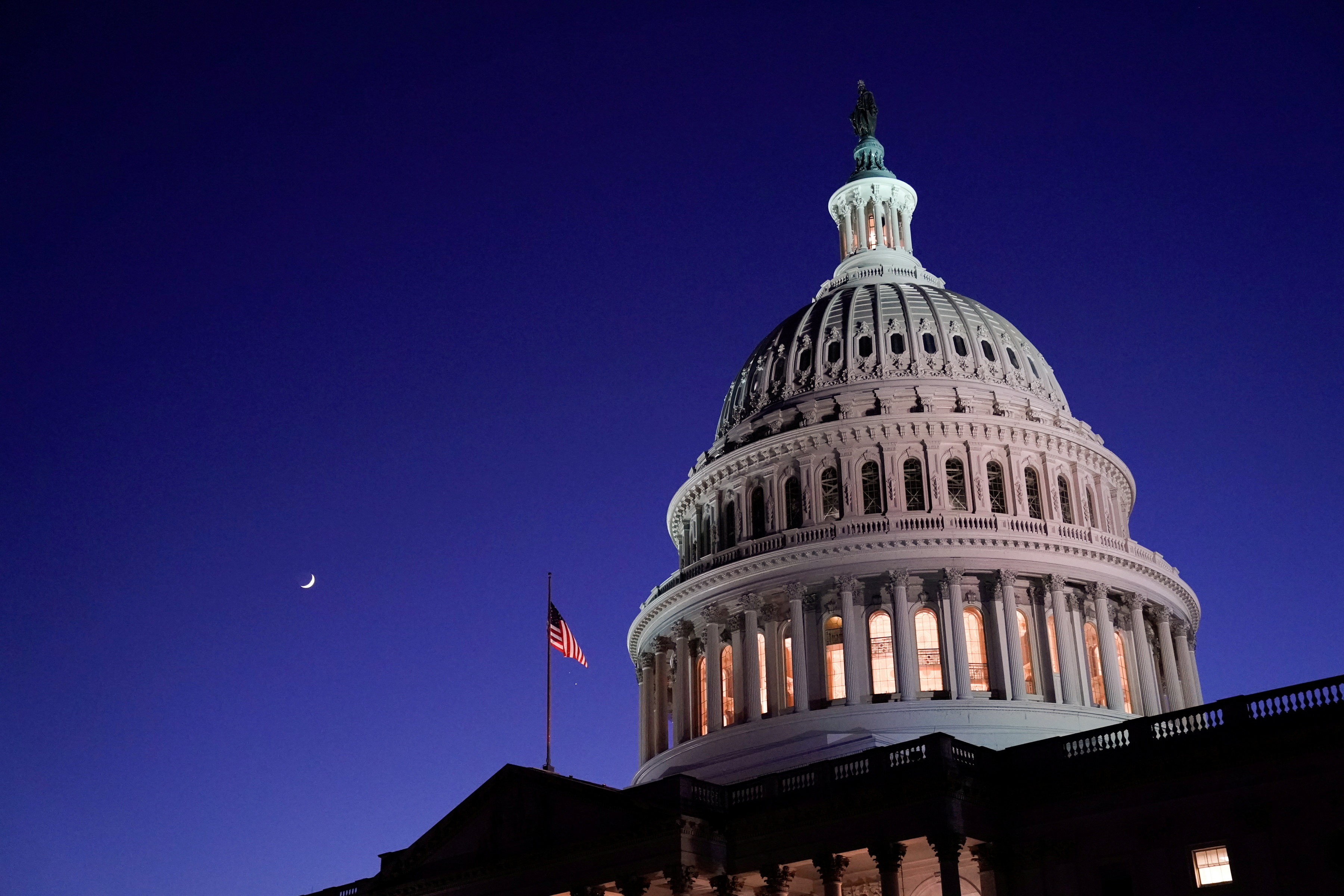 The U.S. Capitol dome is seen at night in Washington