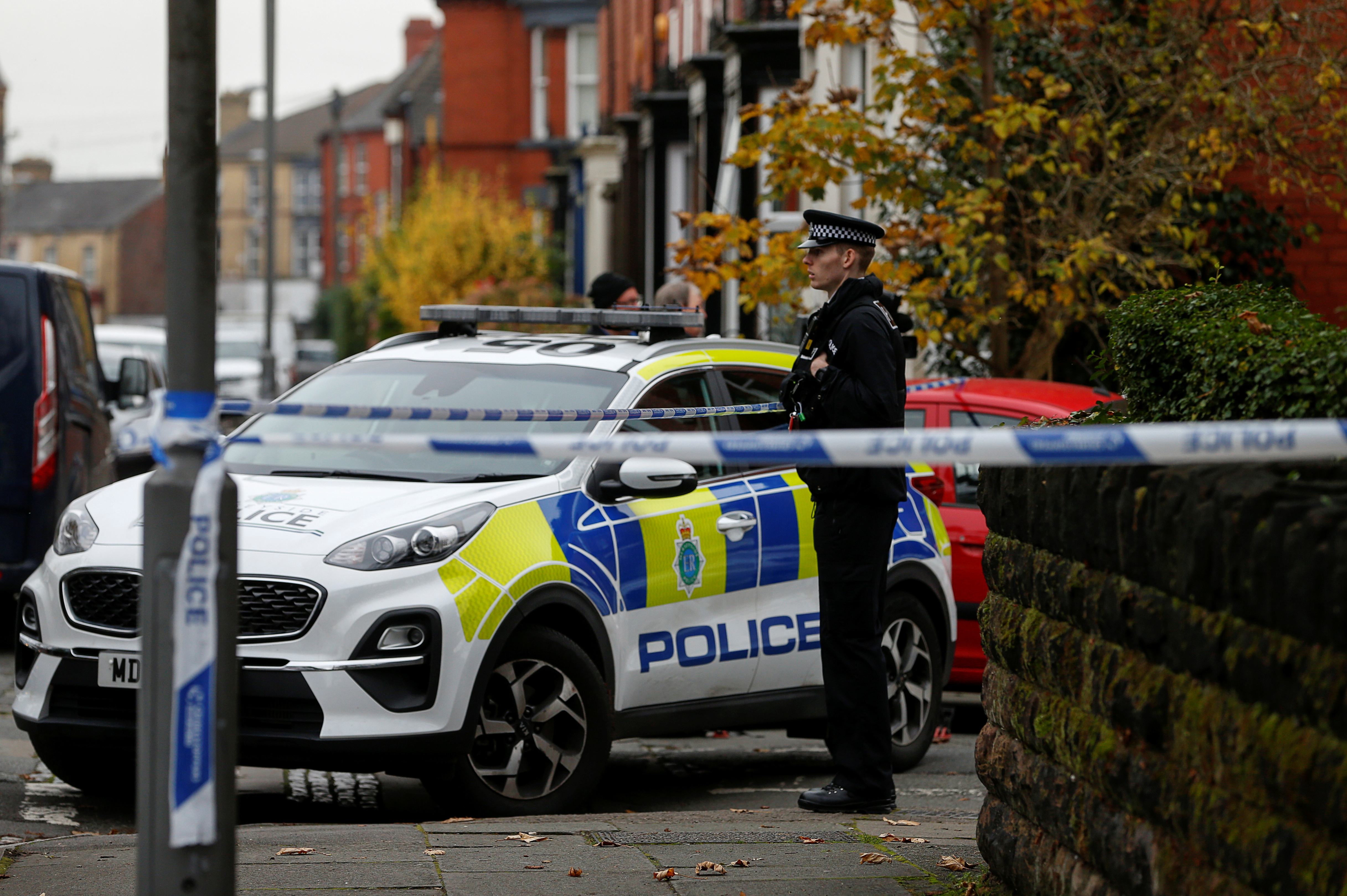 A Police officer stands guard, following the car blast of Liverpool Women's Hospital, in Liverpool, Britain, November 15, 2021. REUTERS/Ed Sykes