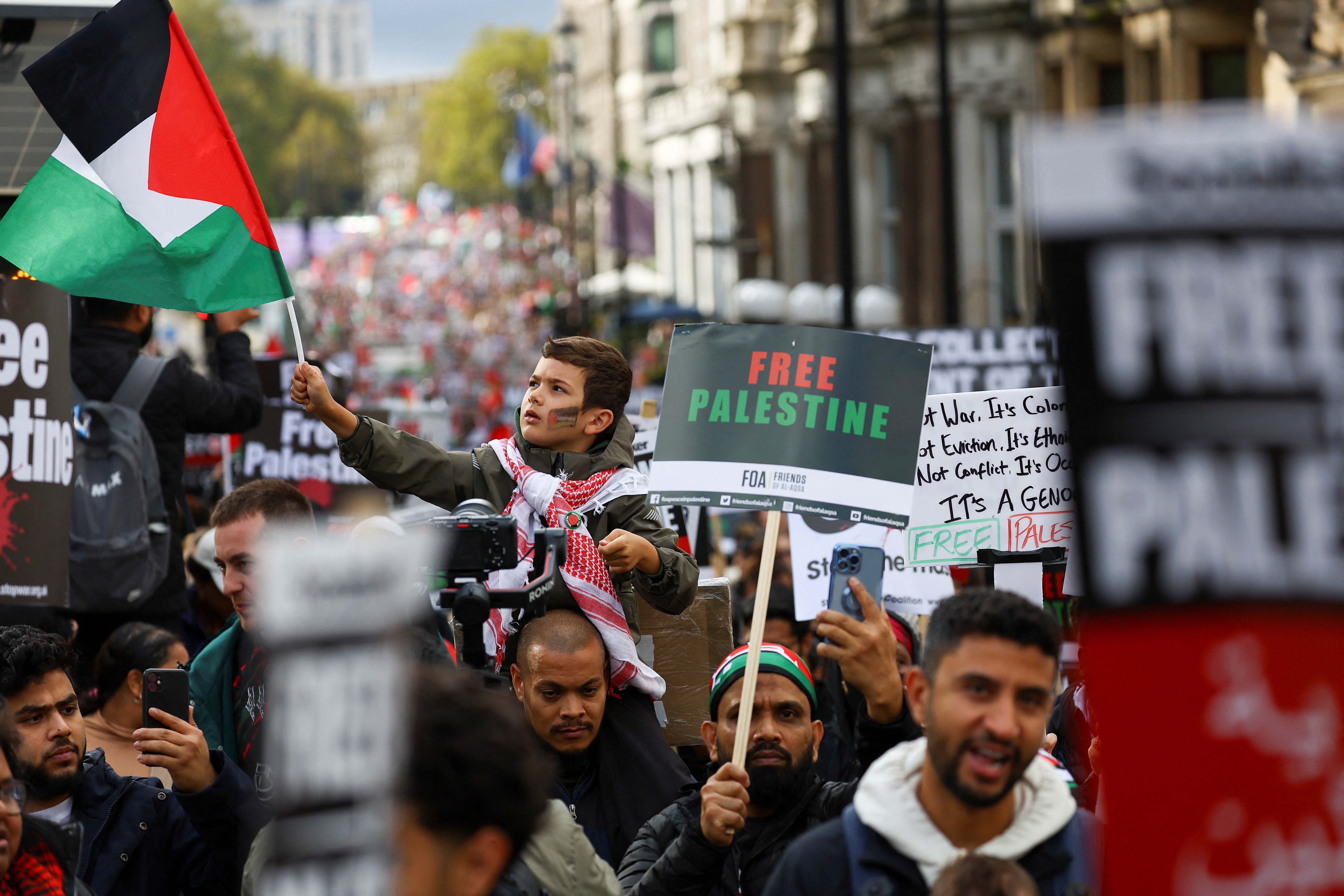 Demonstrators protest in solidarity with Palestinians in Gaza, in London