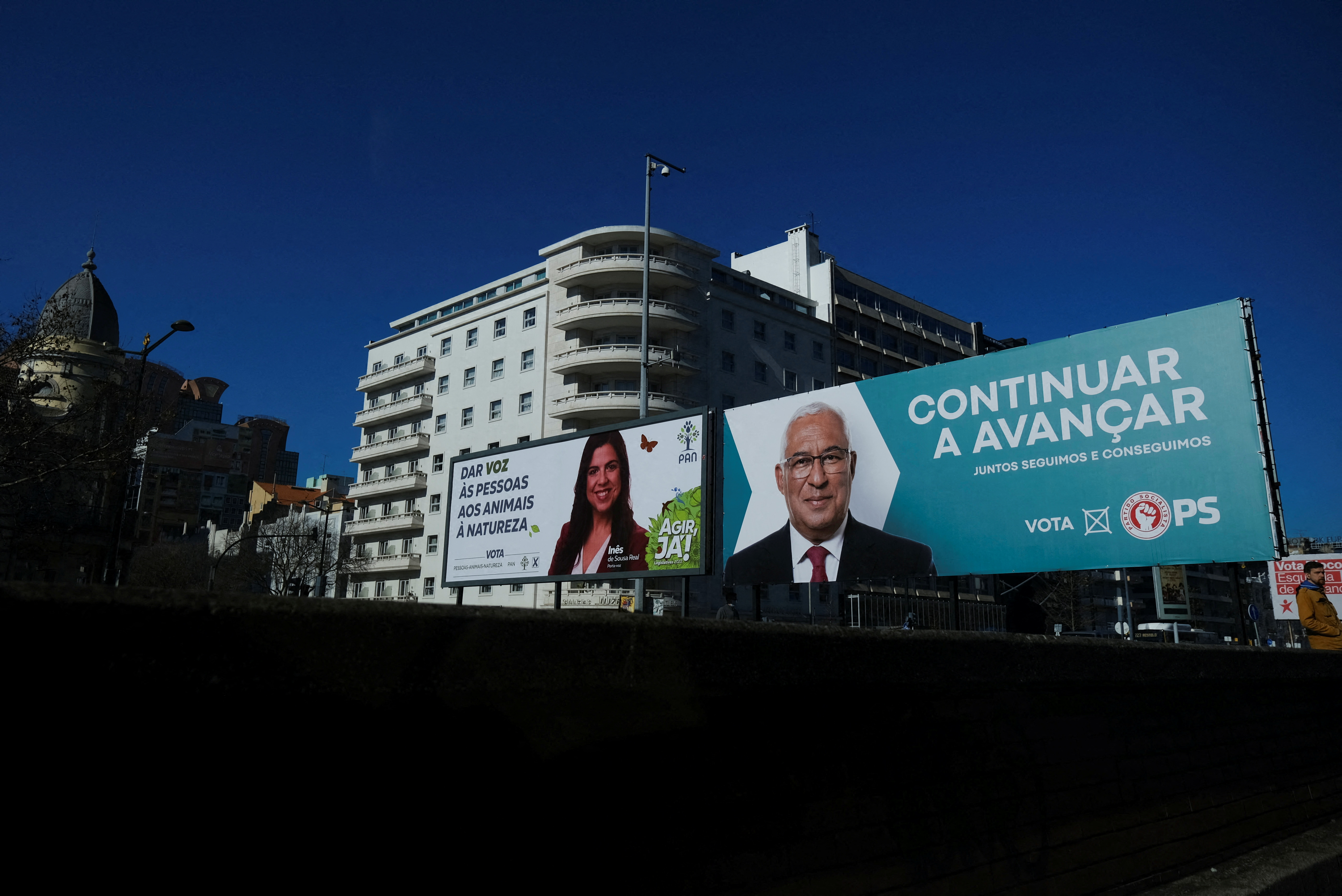 A PAN party and Socialist party PS billboards for the snap elections which is to take place on January 30 are seen in Lisbon