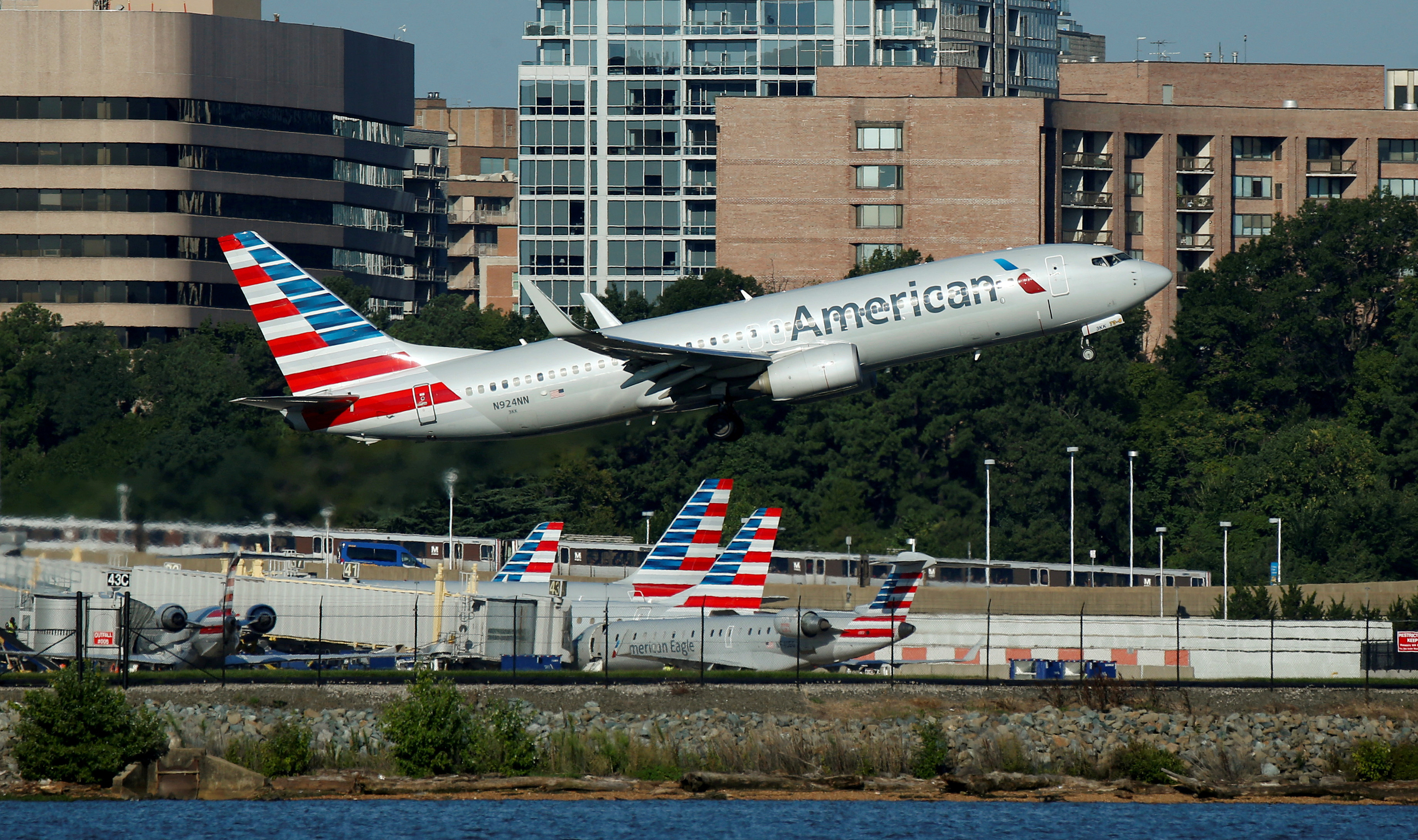 An American Airlines jet takes off from Washington National Airport in Washington