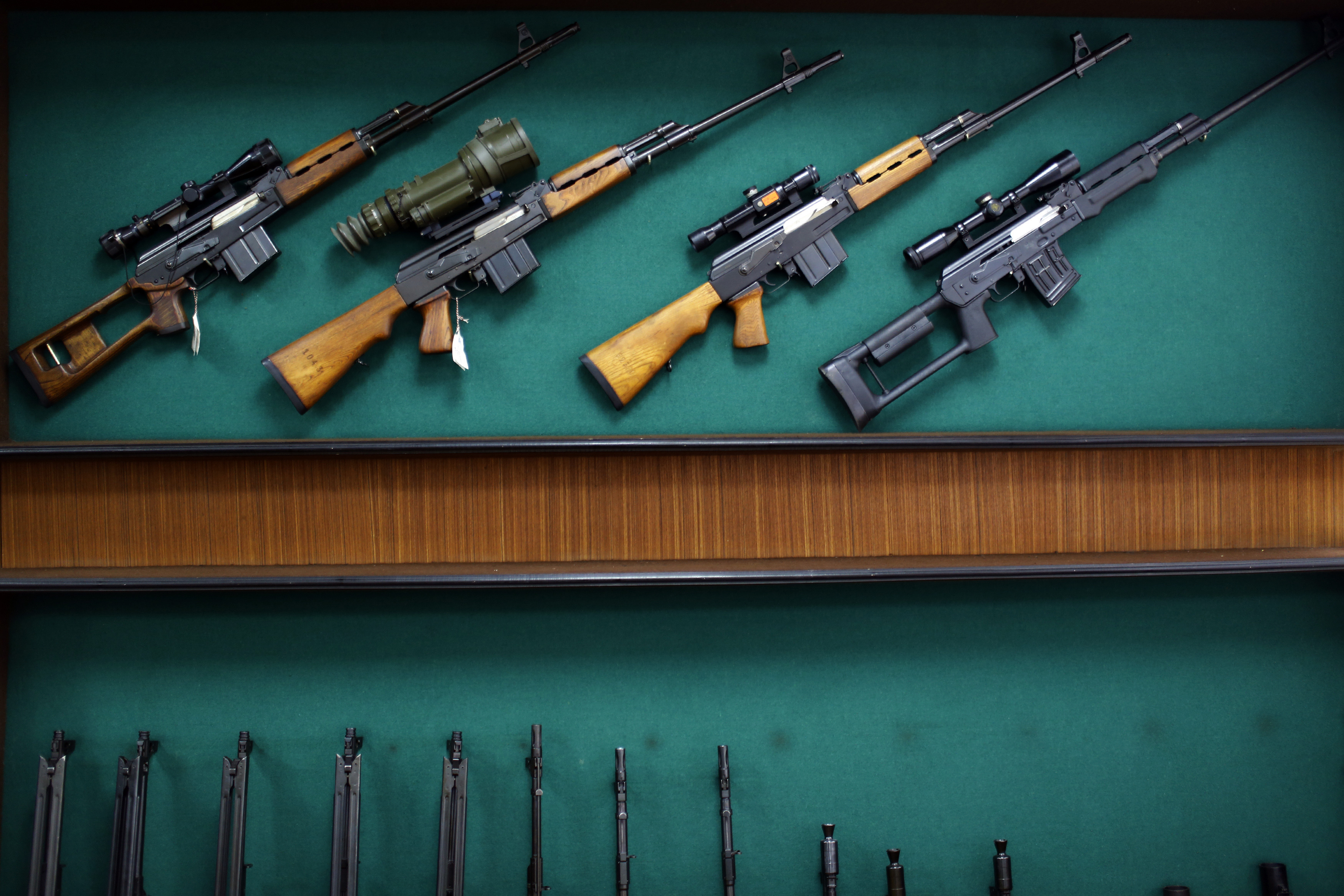 Rifles are displayed in the exhibition hall of the "Zastava Arms" weapons factory in the Serbian town of Kragujevac, some 137km (85 miles) from capital Belgrade, May 8, 2013. Now, knocking on the door of the European Union, one industry in Serbia is leading the way where others have been ravaged by a painful transition to capitalism: guns. Serbia is clawing back old markets for its weapons and ammunition in Africa and the Middle East and former arch foe the U.S., which led the 1999 NATO air war against Slobodan Milosevic. In a country of 25 percent unemployment, weapons producers are adding workers year after year with the value of export contracts now pushing $300 million annually, according to state weapons' exporter Yugoimport-SDPR. Picture taken May 8, 2013. REUTERS/Marko Djurica (SERBIA - Tags: BUSINESS MILITARY)