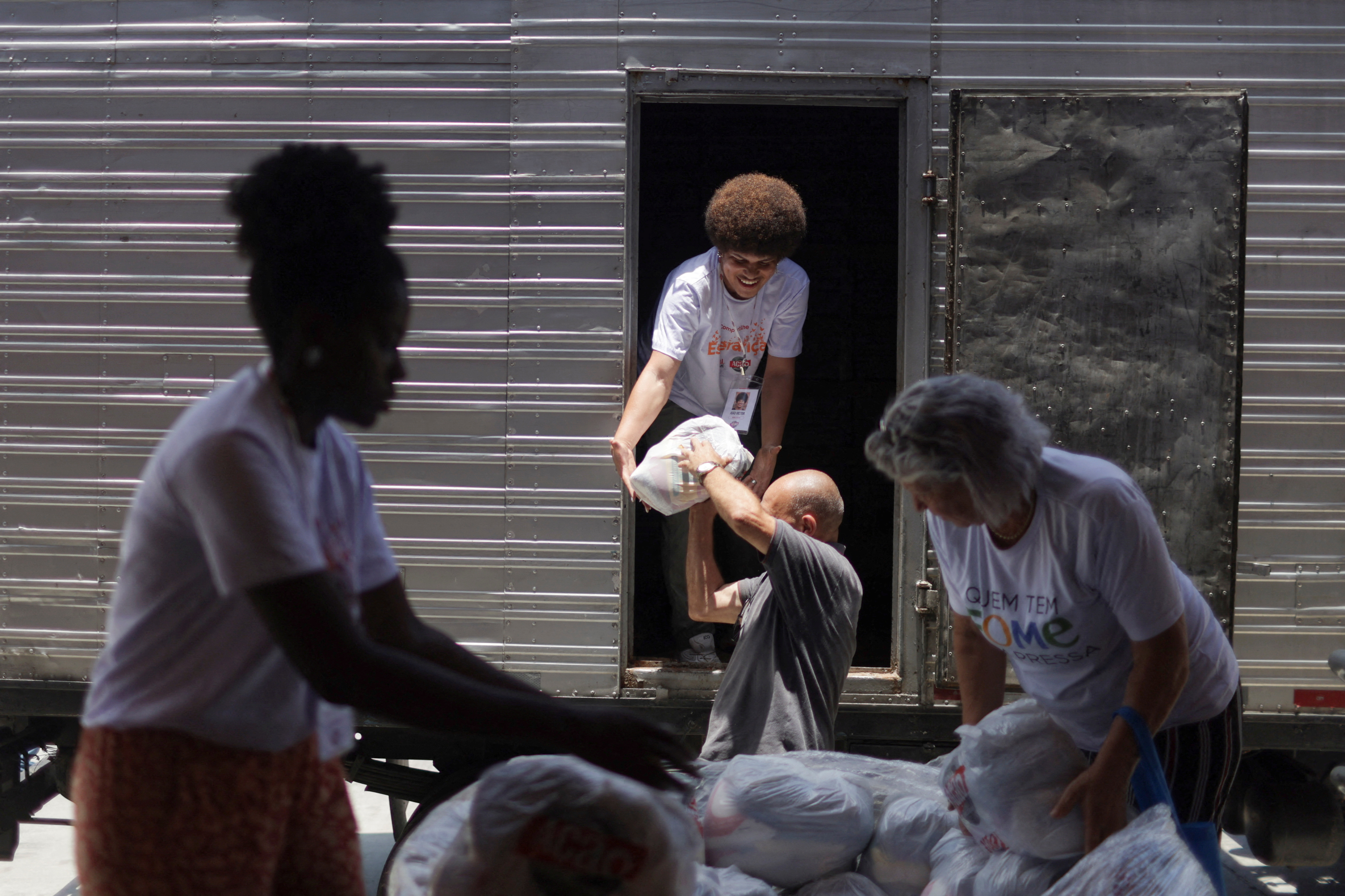 A solidarity fundraising campaign donates food to poor families, in Rio de Janeiro