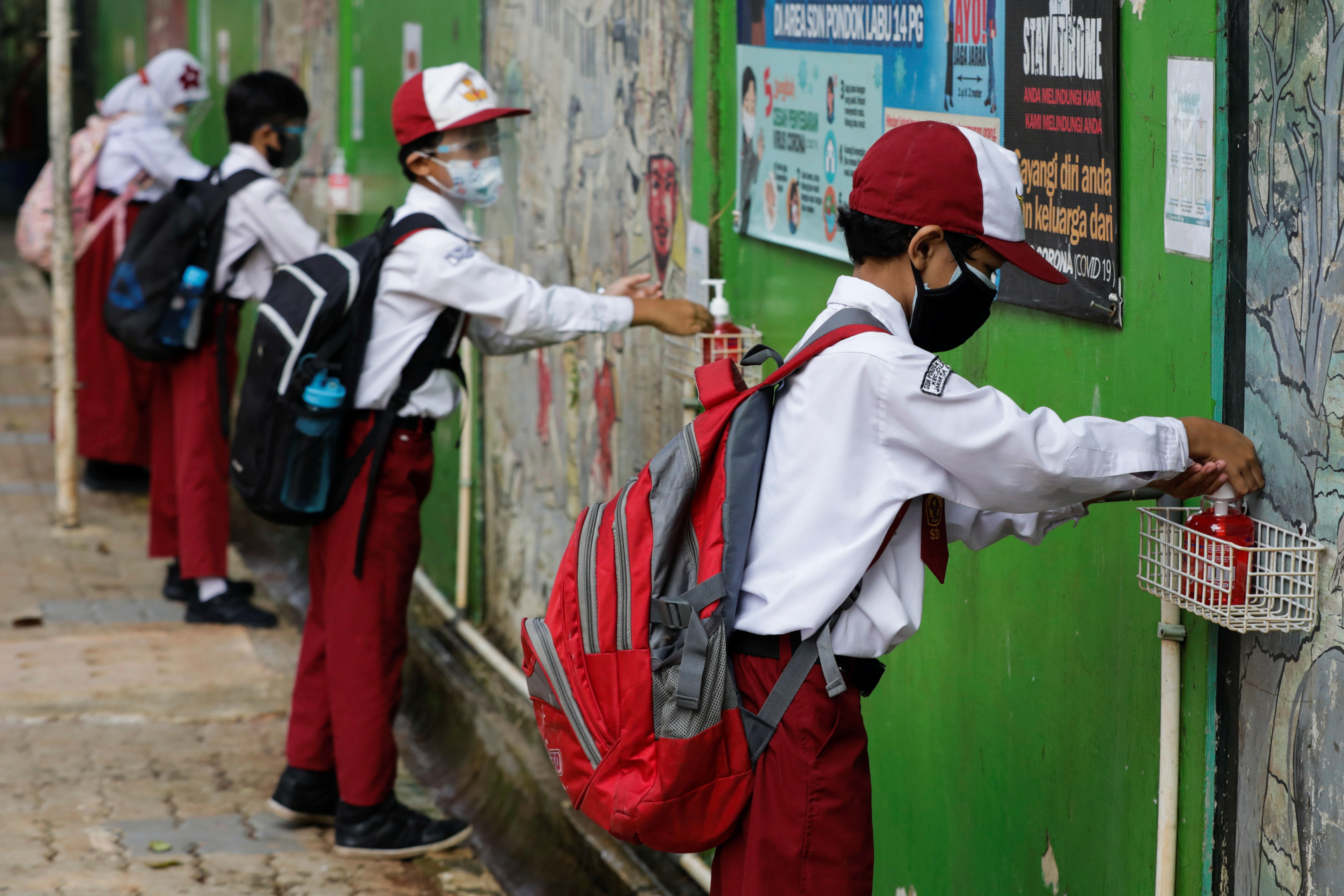 Schools reopen on trail basis as the government extends restrictions to curb the spread of coronavirus disease (COVID-19) in Jakarta