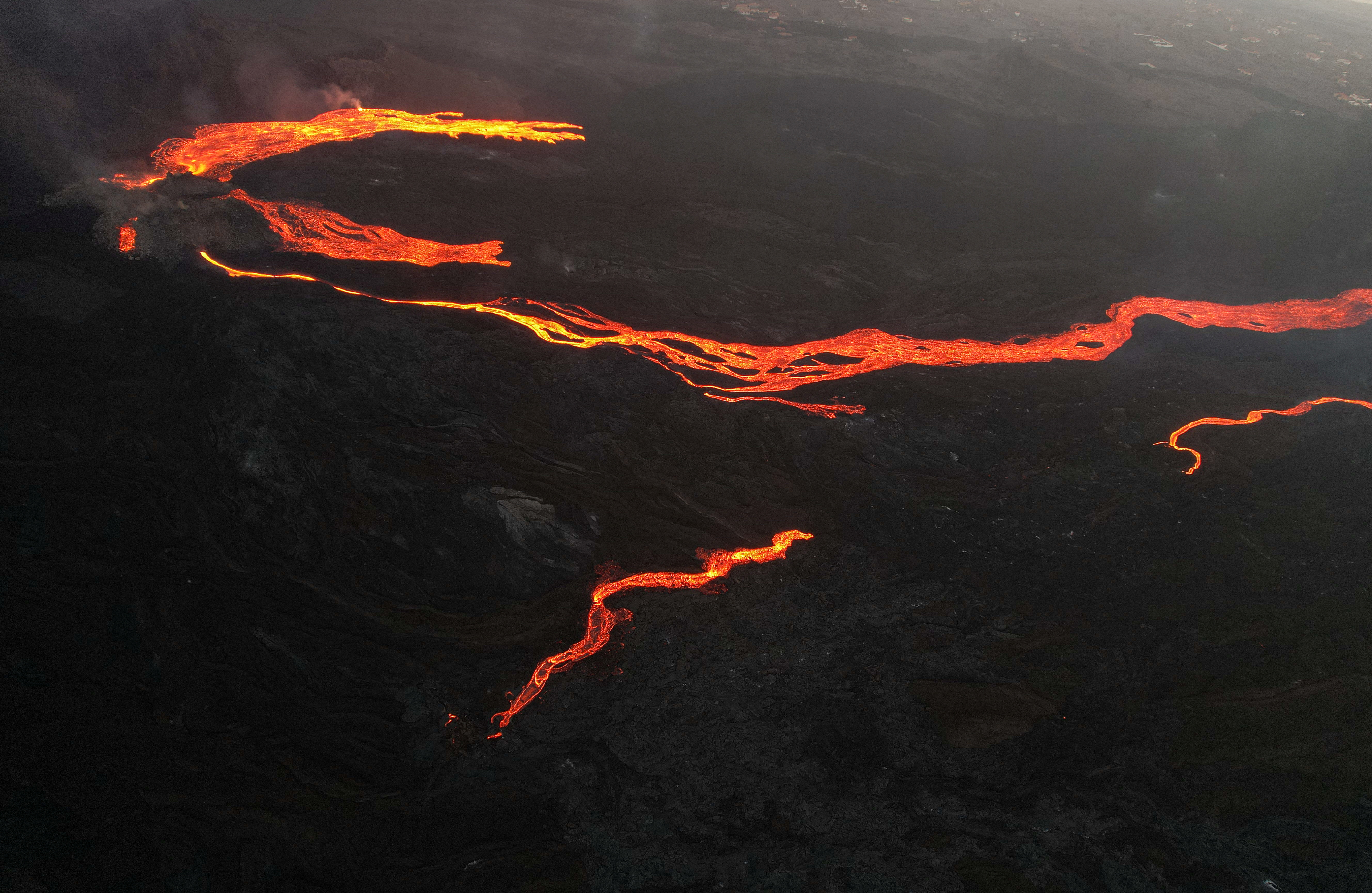 An aerial view of the lava from the Cumbre Vieja volcano near Tacande neighborhood, on the Canary Island of La Palma, Spain, December 13, 2021. REUTERS/Borja Suarez