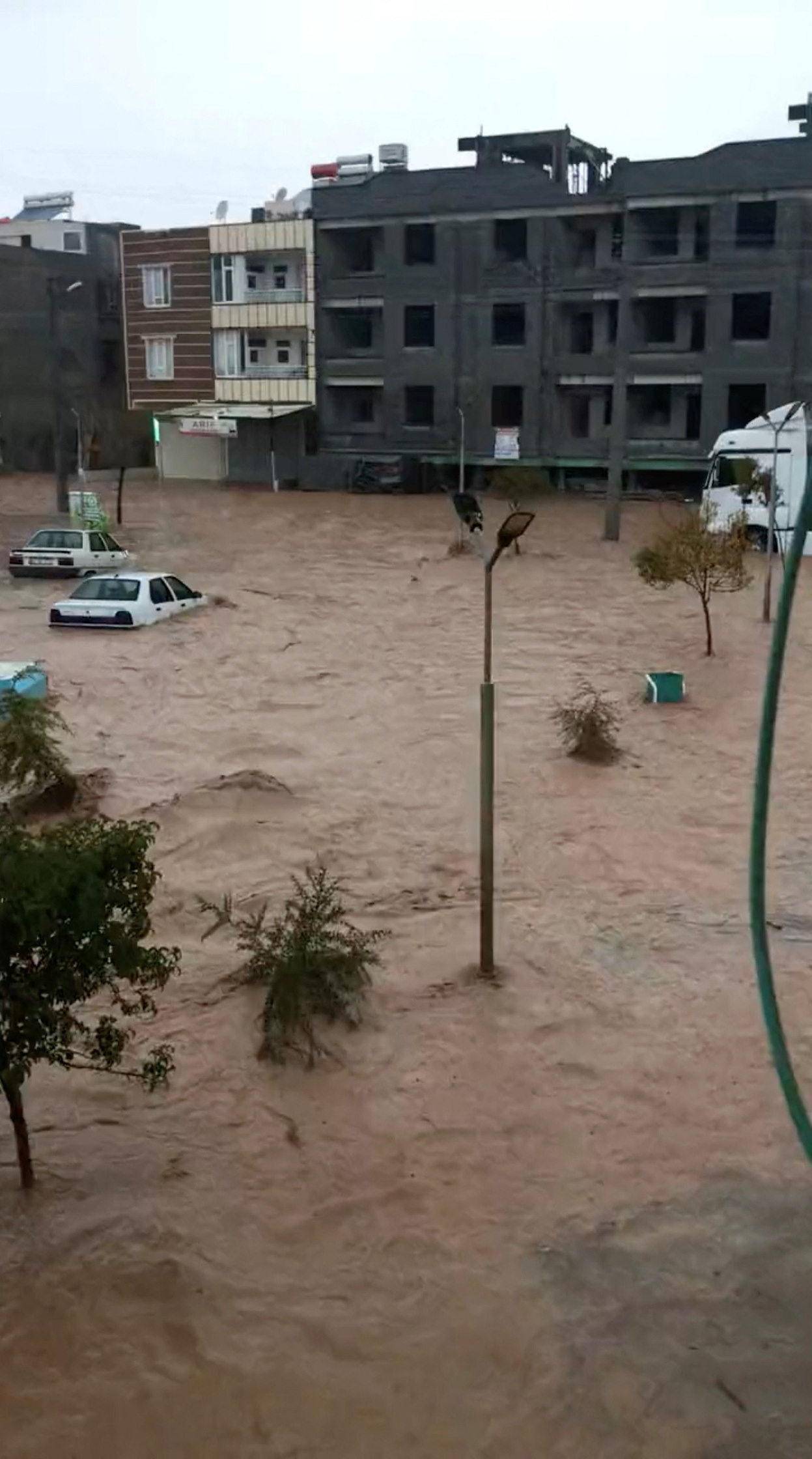 General view shows a flooded street in Sanliurfa
