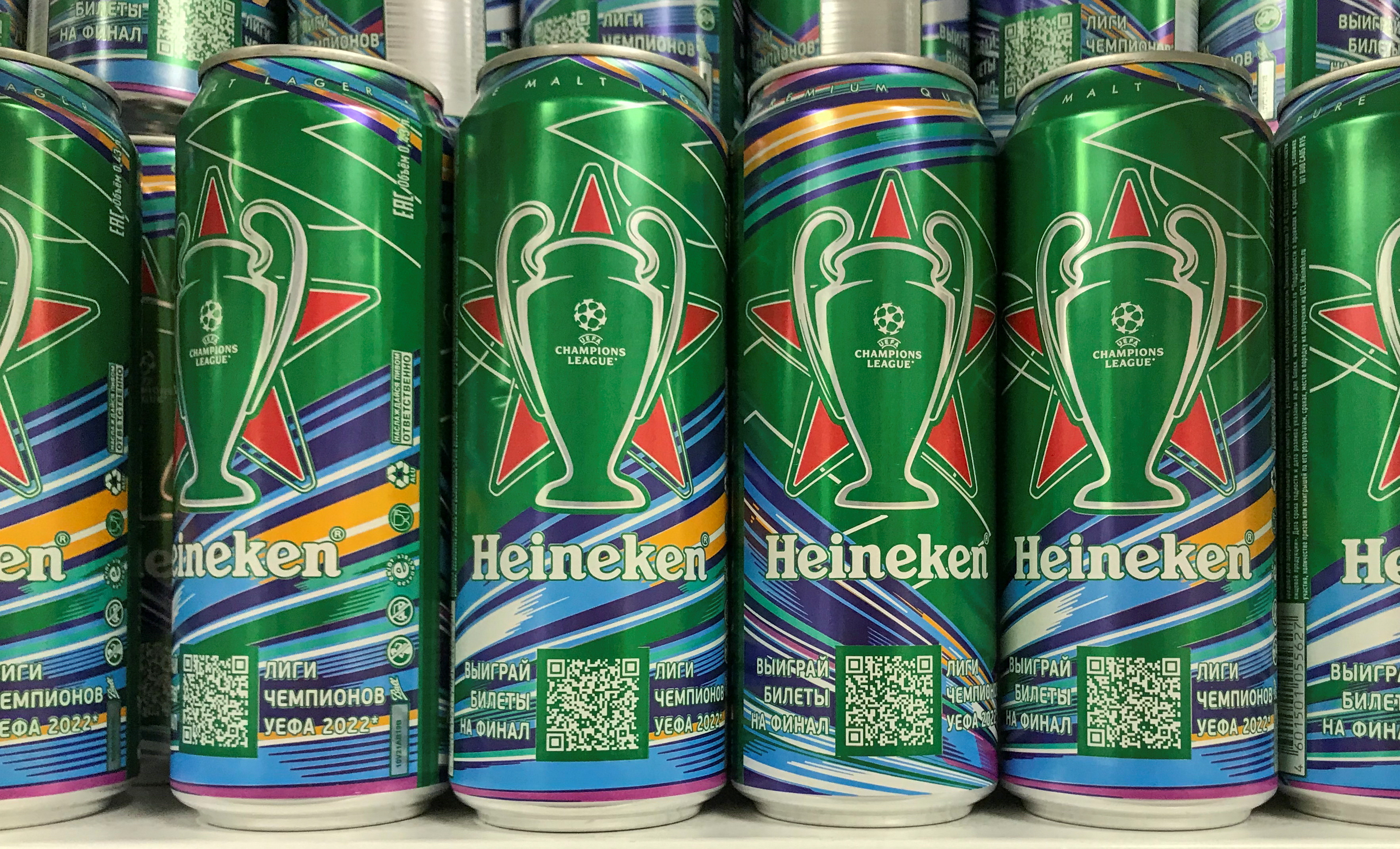 Cans of Heineken beer are displayed at a shop in Moscow