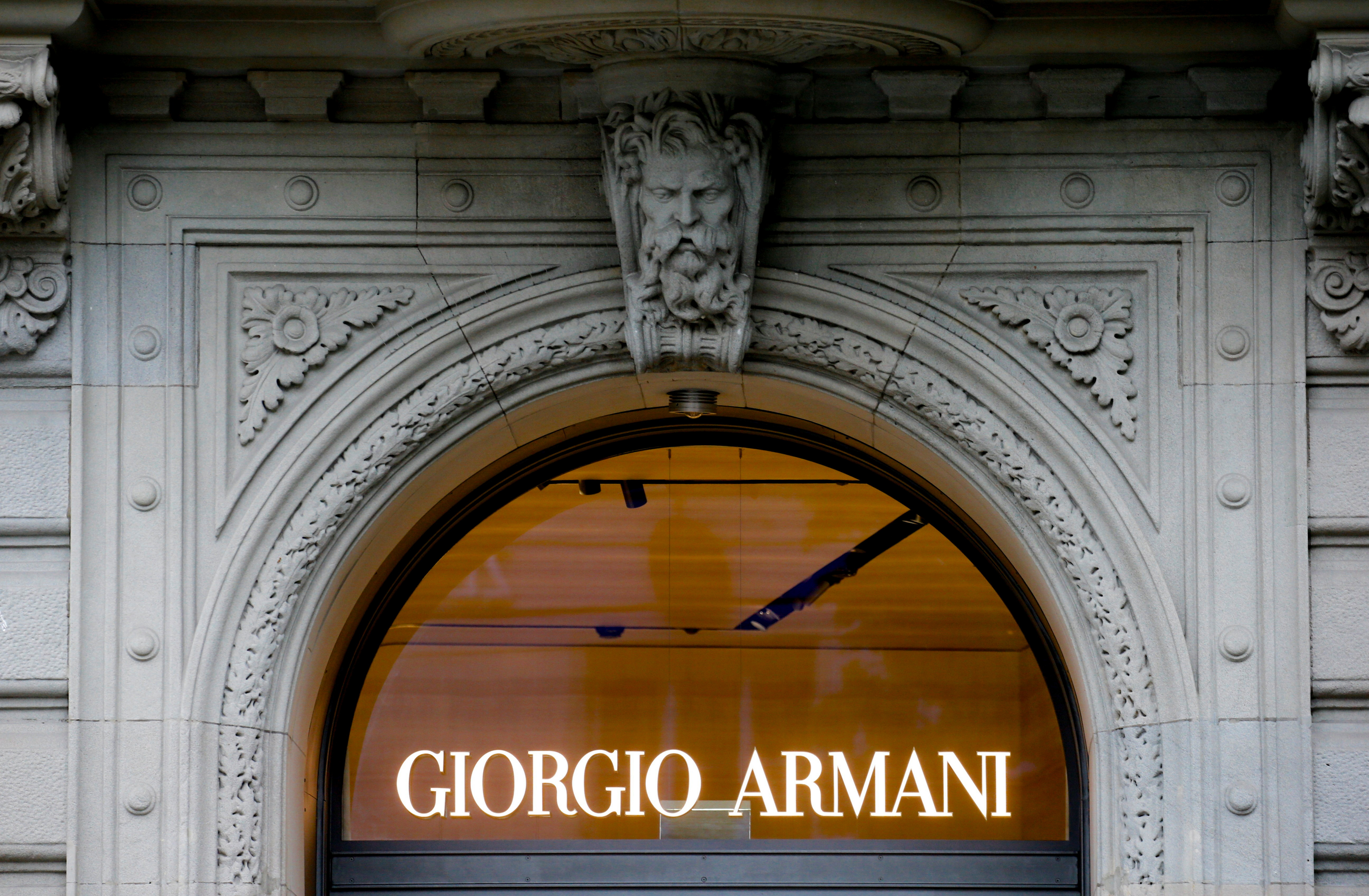 The logo of Italian fashion company Giorgio Armani is seen in Zurich