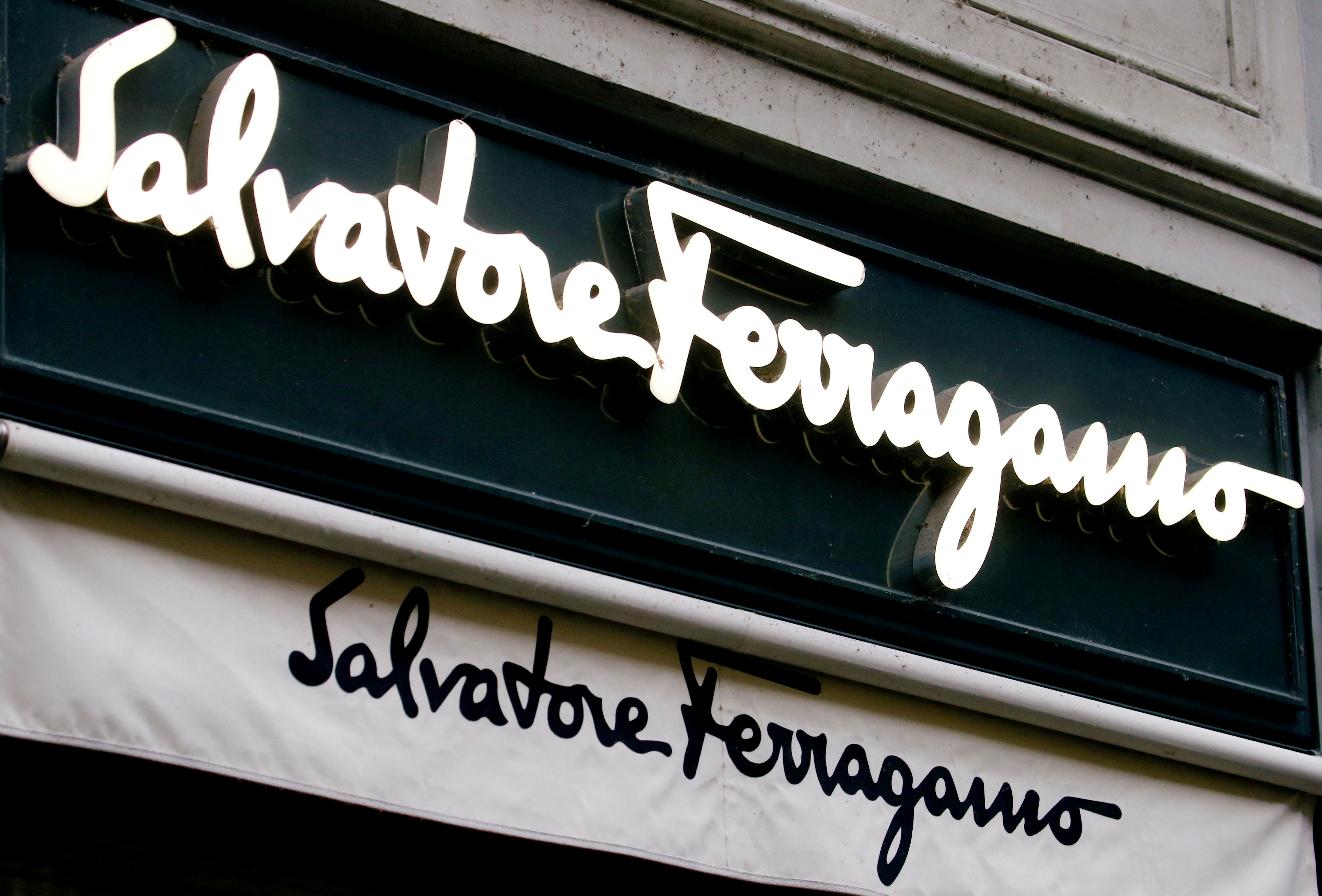 Italian luxury fashion house Salvatore Ferragamo's logo is seen at a store, as the spread of the coronavirus disease (COVID-19) continues, in Zurich, Switzerland January 25, 2021. REUTERS/Arnd Wiegmann/File Photo