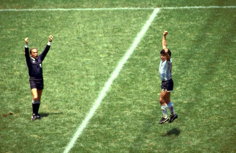 Argentina's Diego Maradona celebrates as referee Romualdo Arppi Filho blows the final whistle during their World Cup Final against West Germany, 1986. Action Images/via REUTERS
