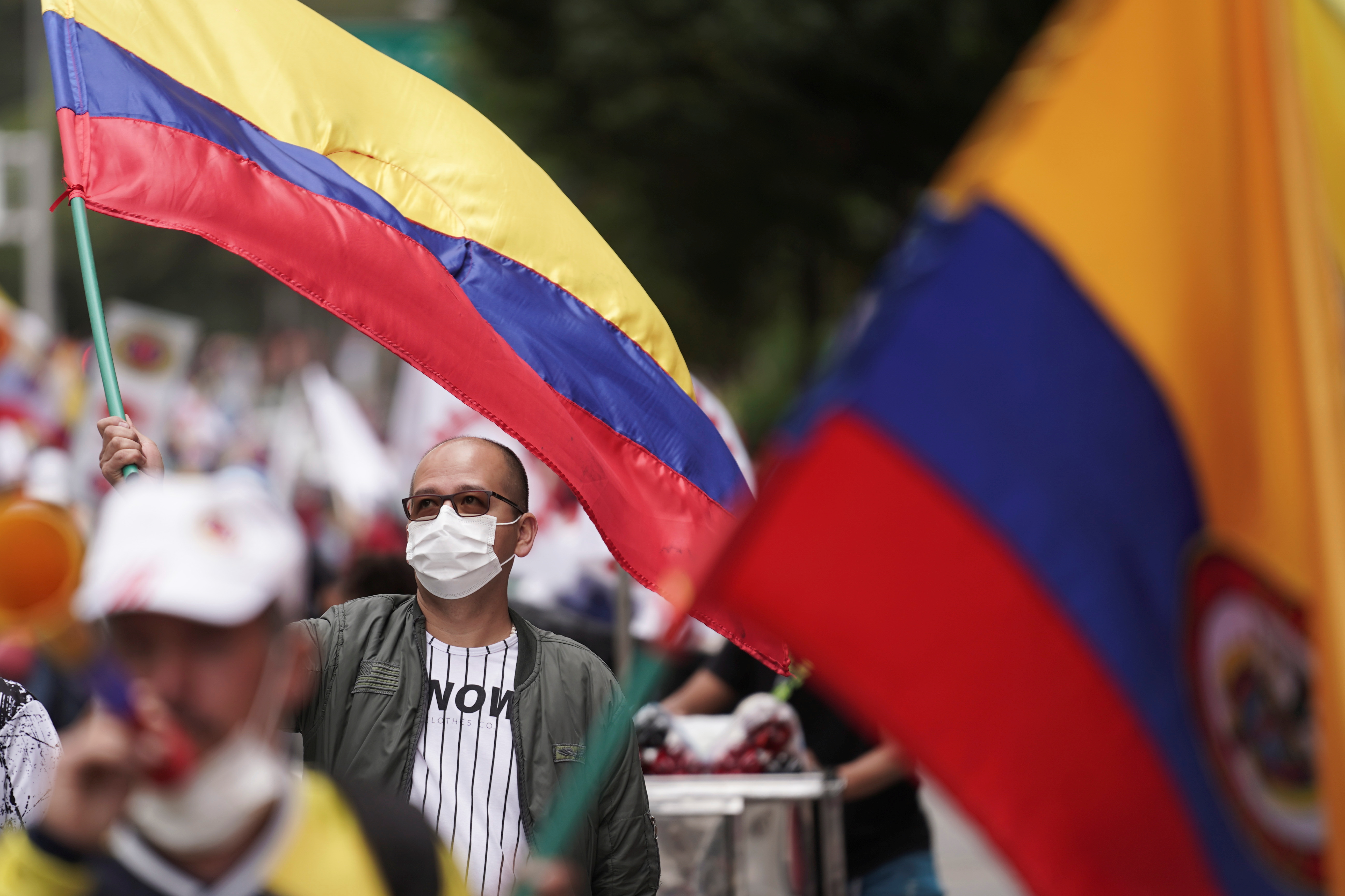 Demonstrators gather for an anti-government march demanding changes to the social and economic policies, during Colombia's Independence Day, in Bogota
