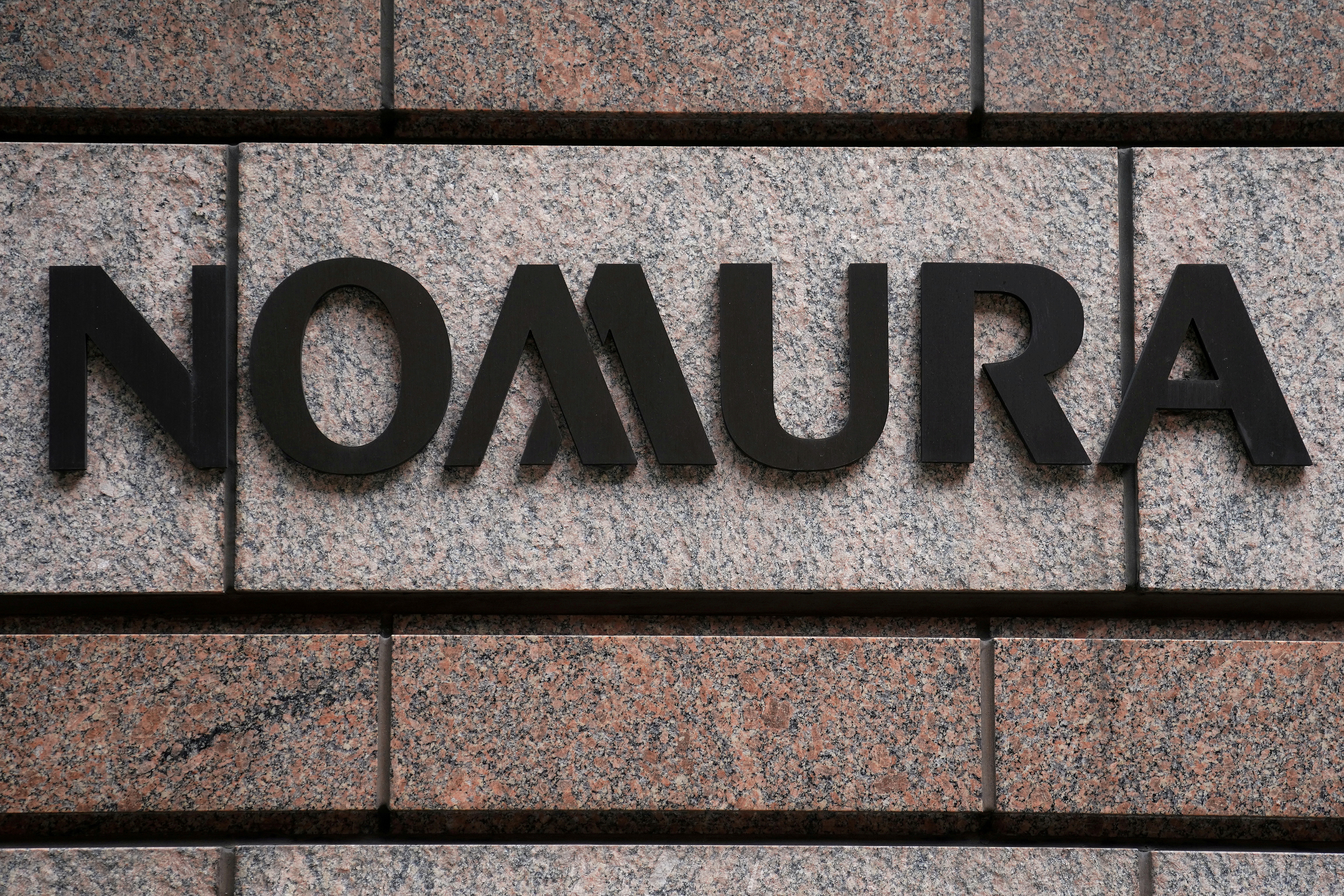 A Nomura logo is pictured at the Japanese company's office in the Manhattan borough of New York City