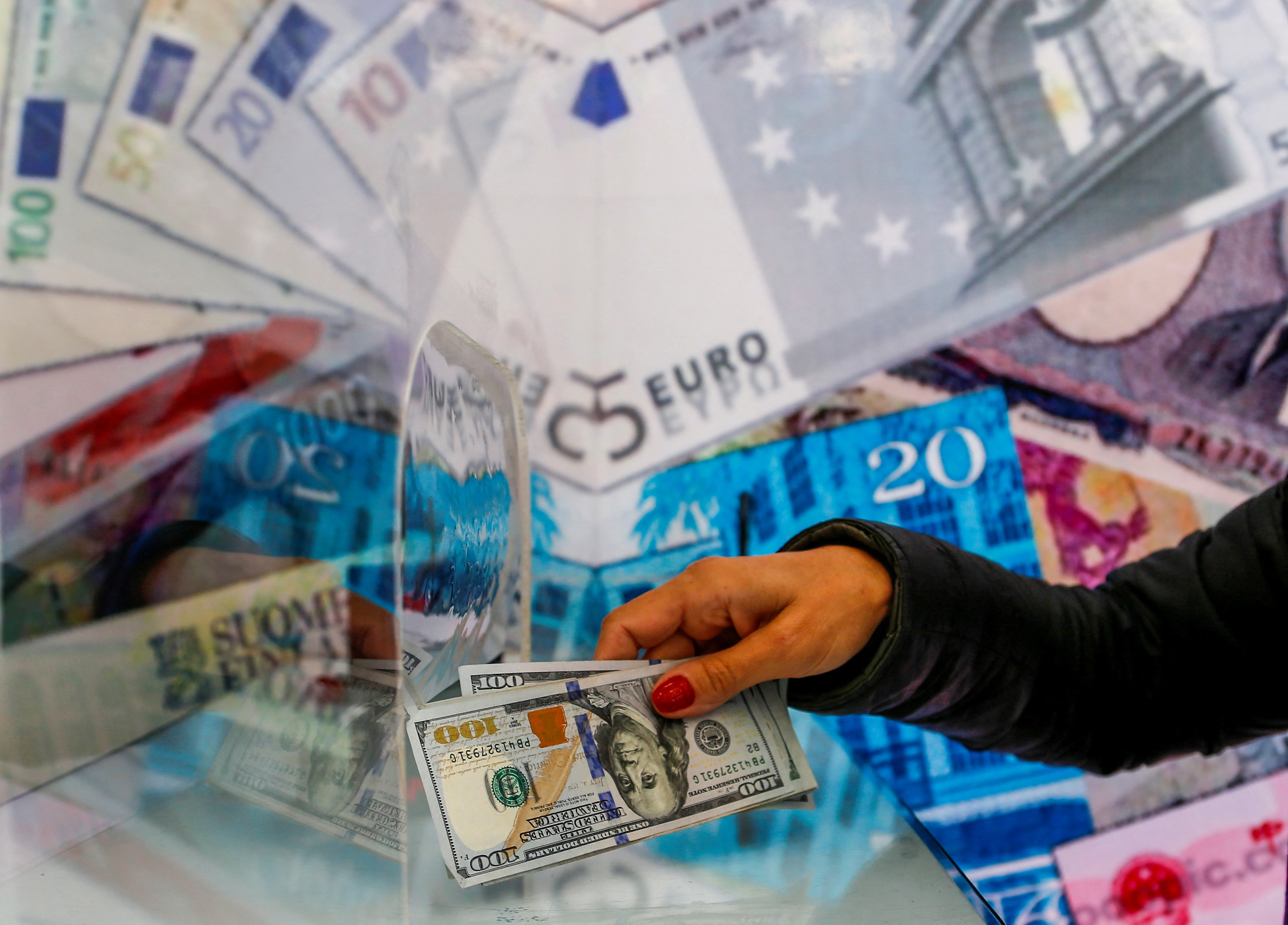 A money changer sells U.S. dollar bills in Ankara