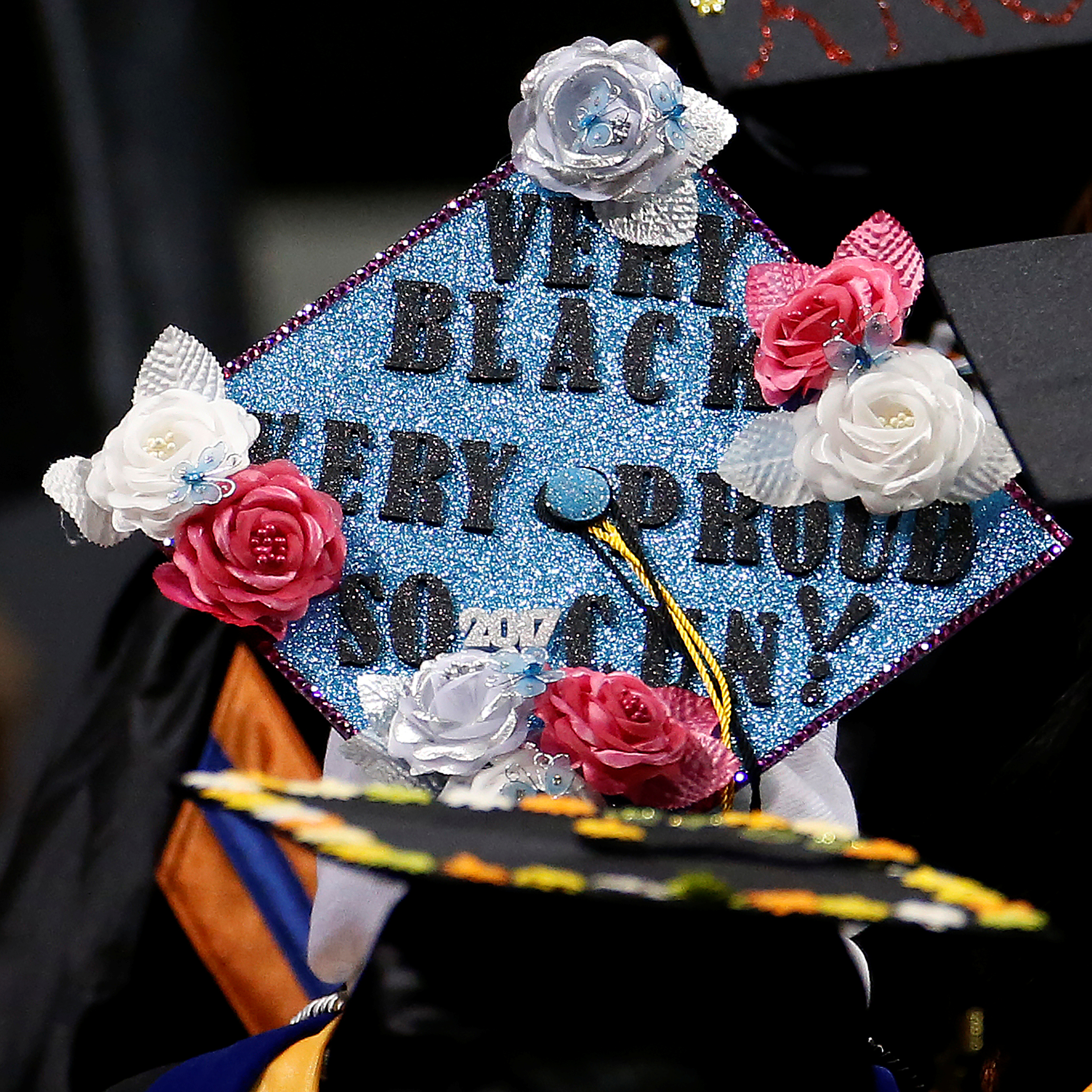 A graduate's mortar board hat is pictured during a commencement for Medgar Evers College in the Brooklyn borough of New York City