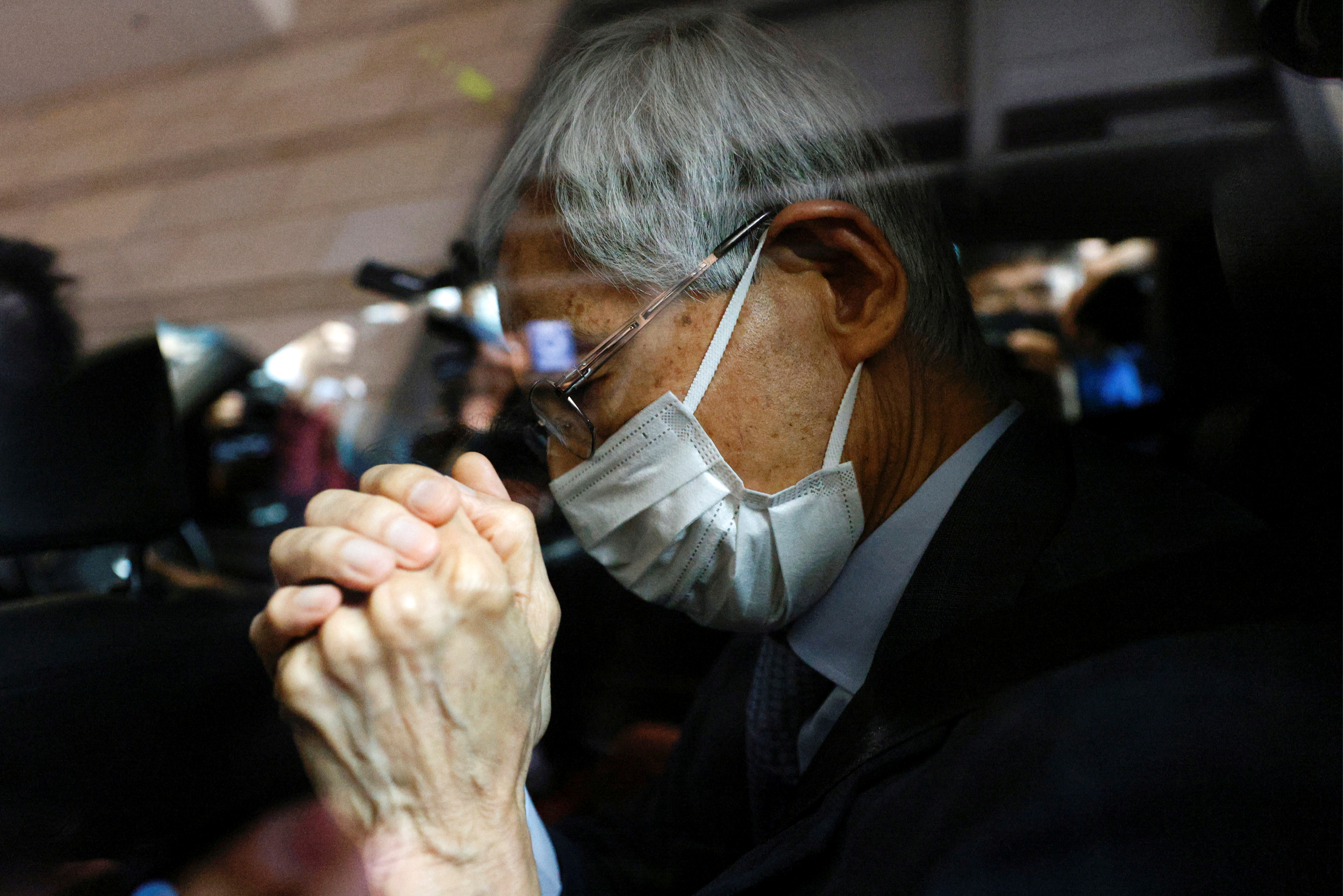 Democratic Party founder and barrister Martin Lee leaves the West Kowloon Courts after getting his suspended sentence on unauthorised assembly, in Hong Kong