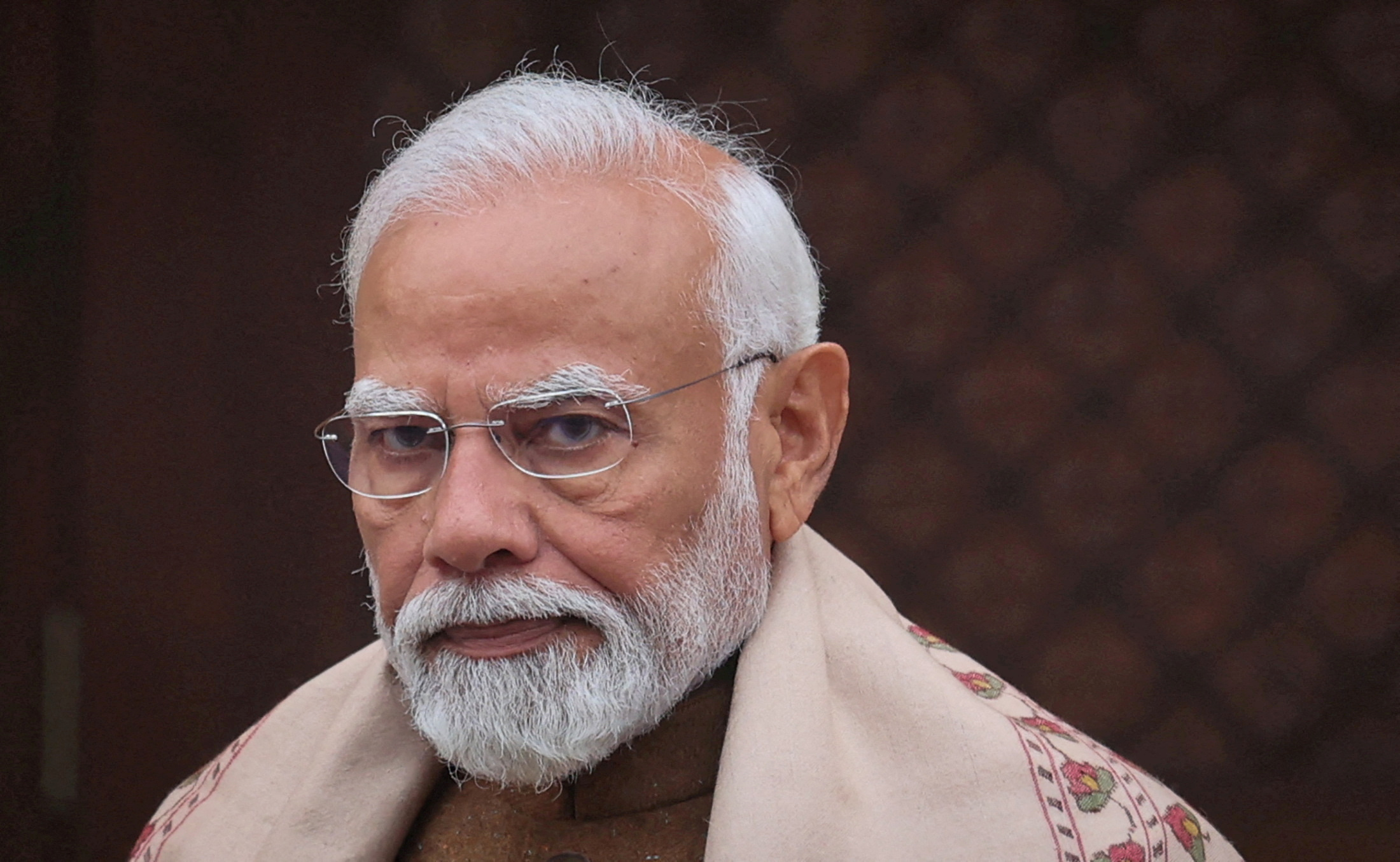 India's PM Modi looks on after speaking with media inside parliament premises, in New Delhi