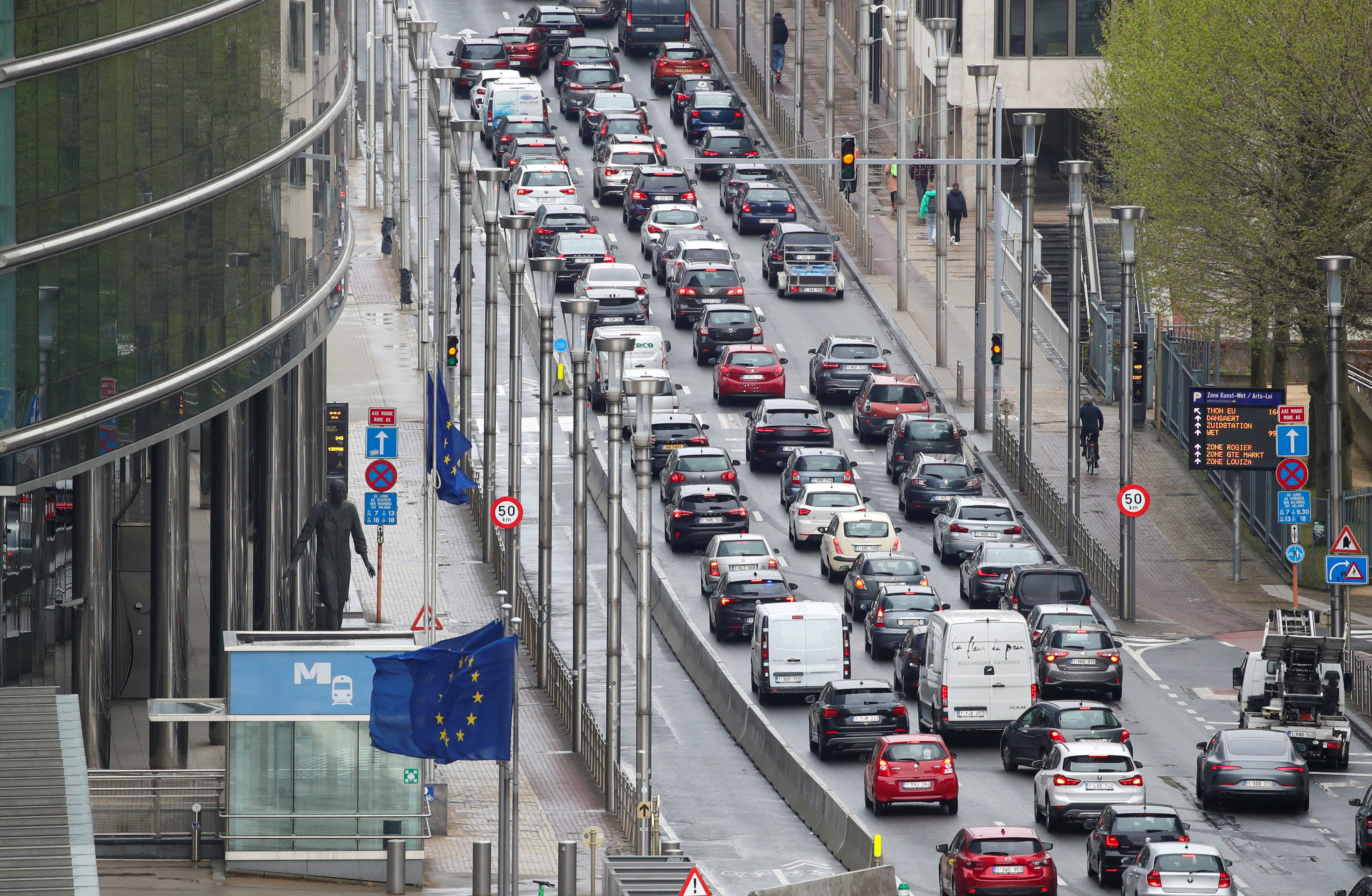 View shows cars stuck in traffic jam on a road heading towards central Brussels