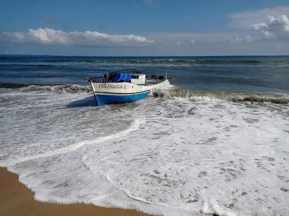 Boat that sank off the coast of northeastern Madagascar on Monday is pulled to the beach