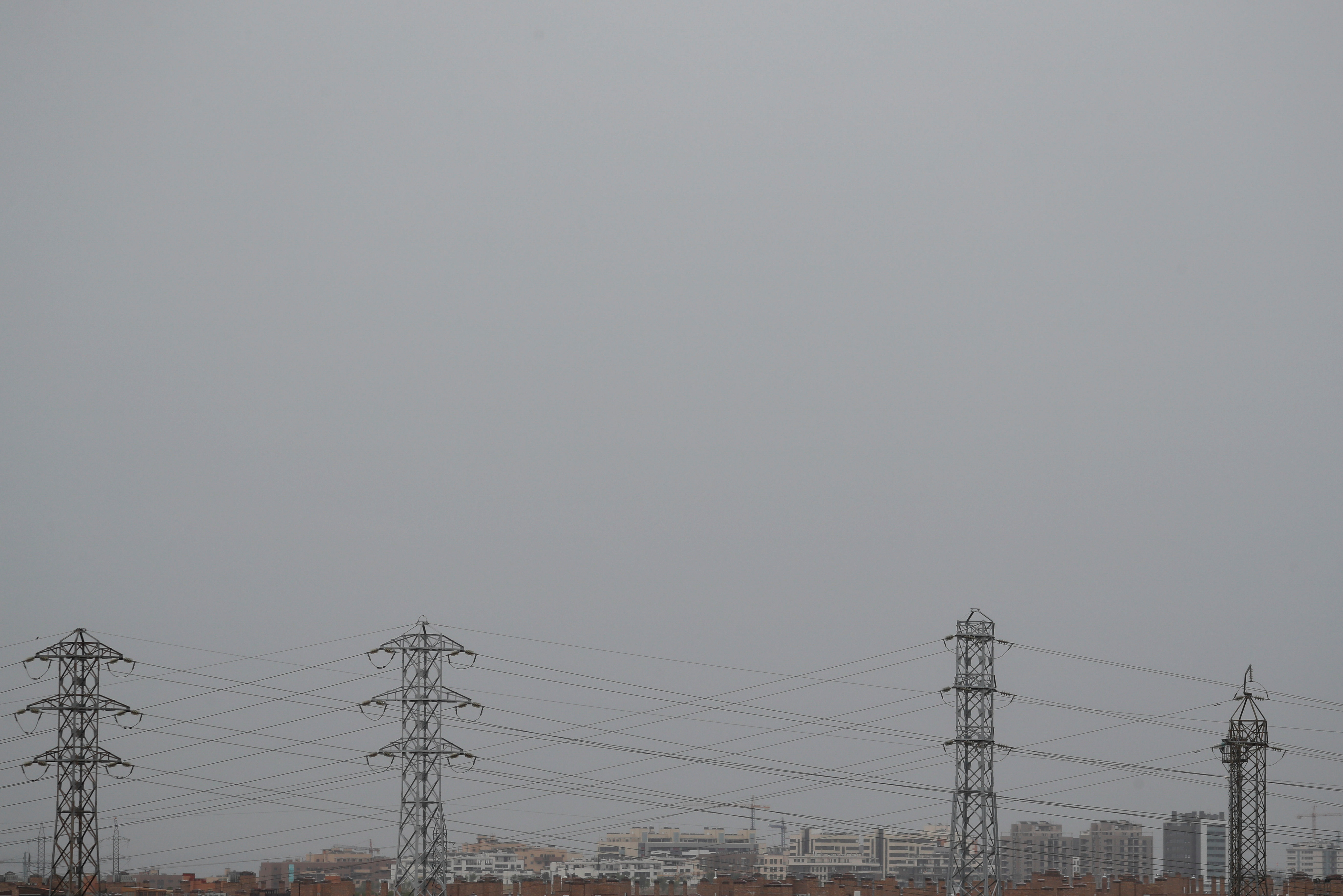 High-tension electricity towers are seen on the outskirts of Madrid