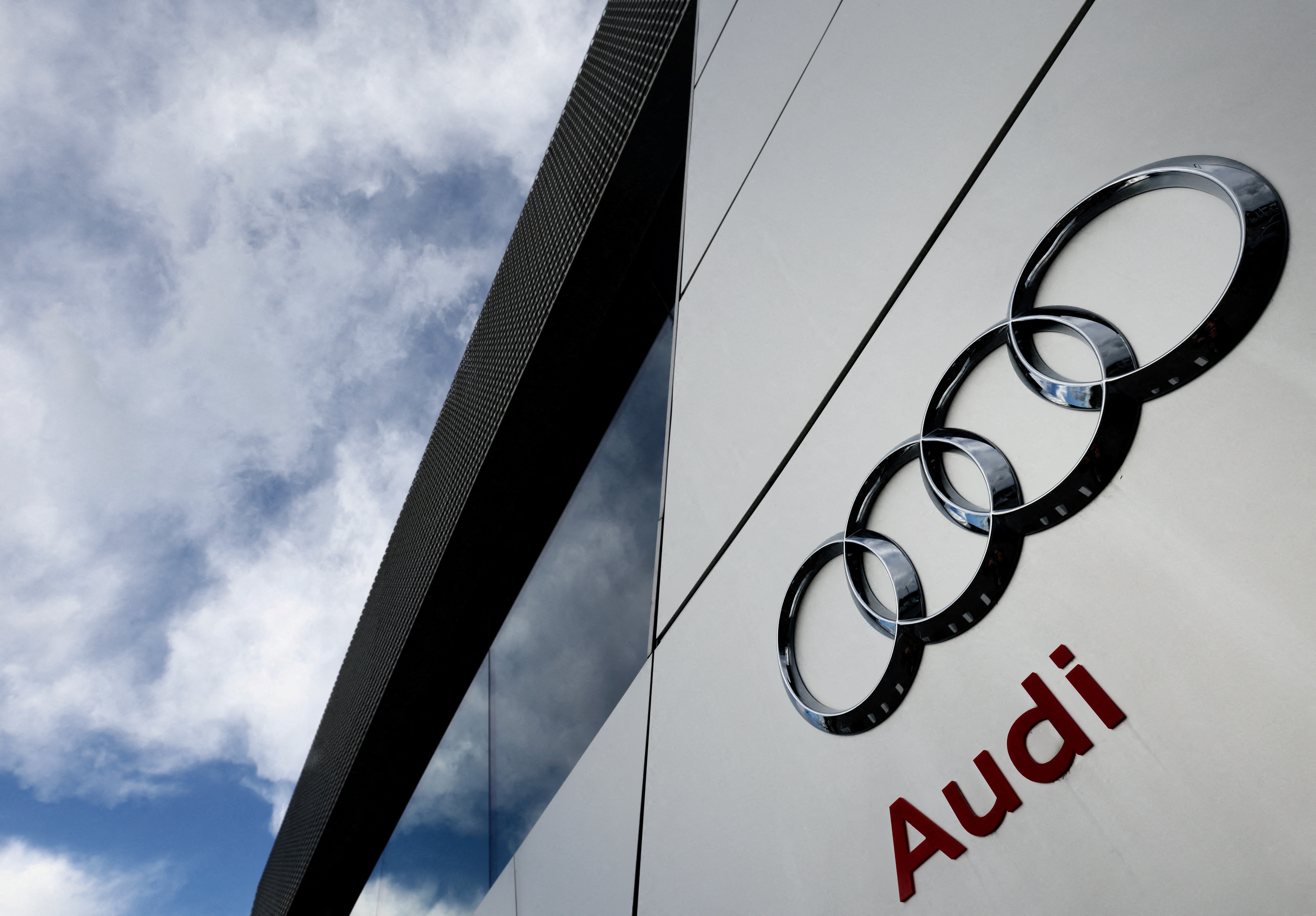 A logo of Audi is seen outside an Audi car dealer in Brussels