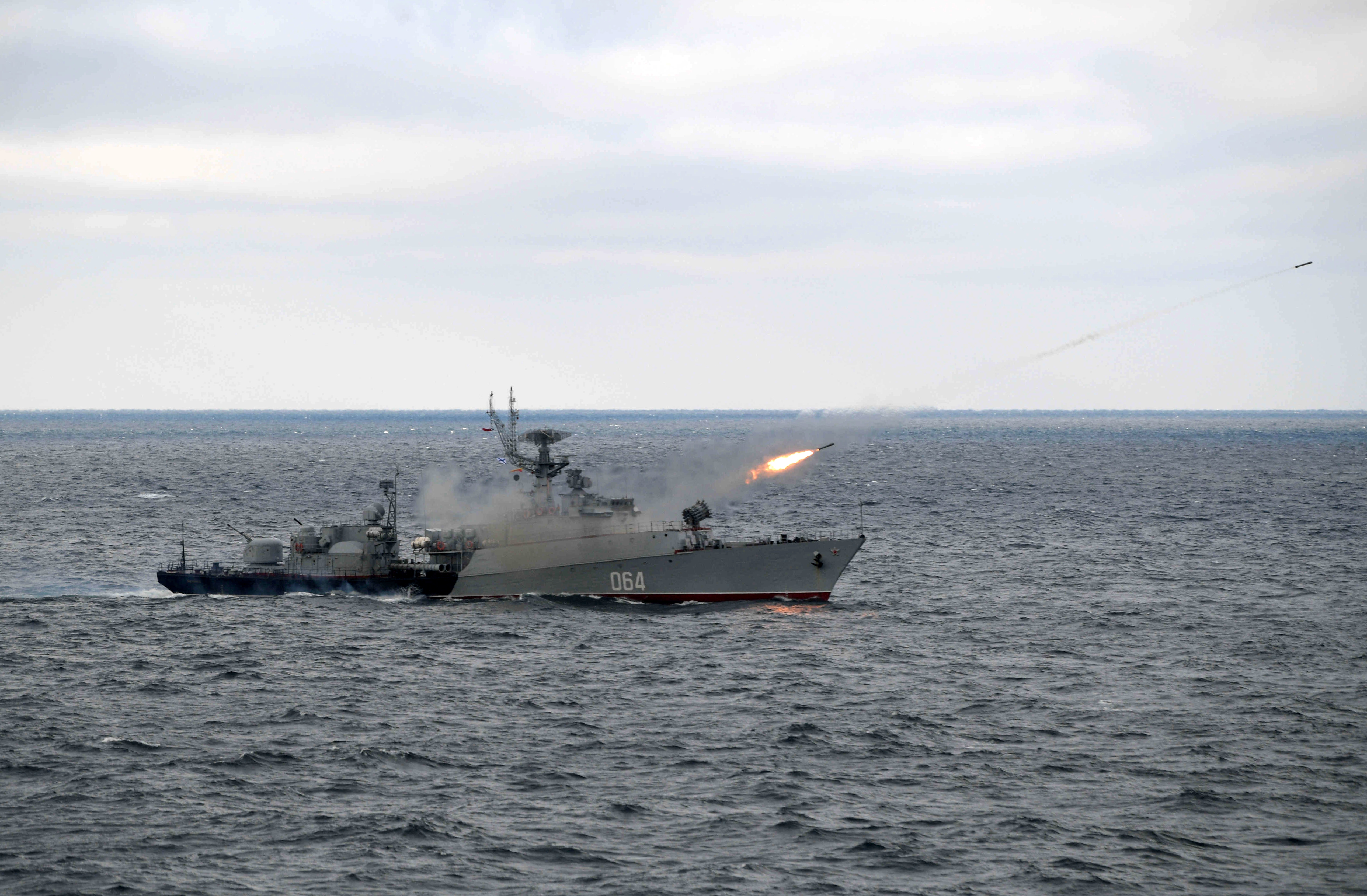 Russian anti-submarine corvette Muromets fires during the joint drills of the Northern and Black Sea fleets, attended by Russian President Vladimir Putin, in the Black Sea, off the coast of Crimea