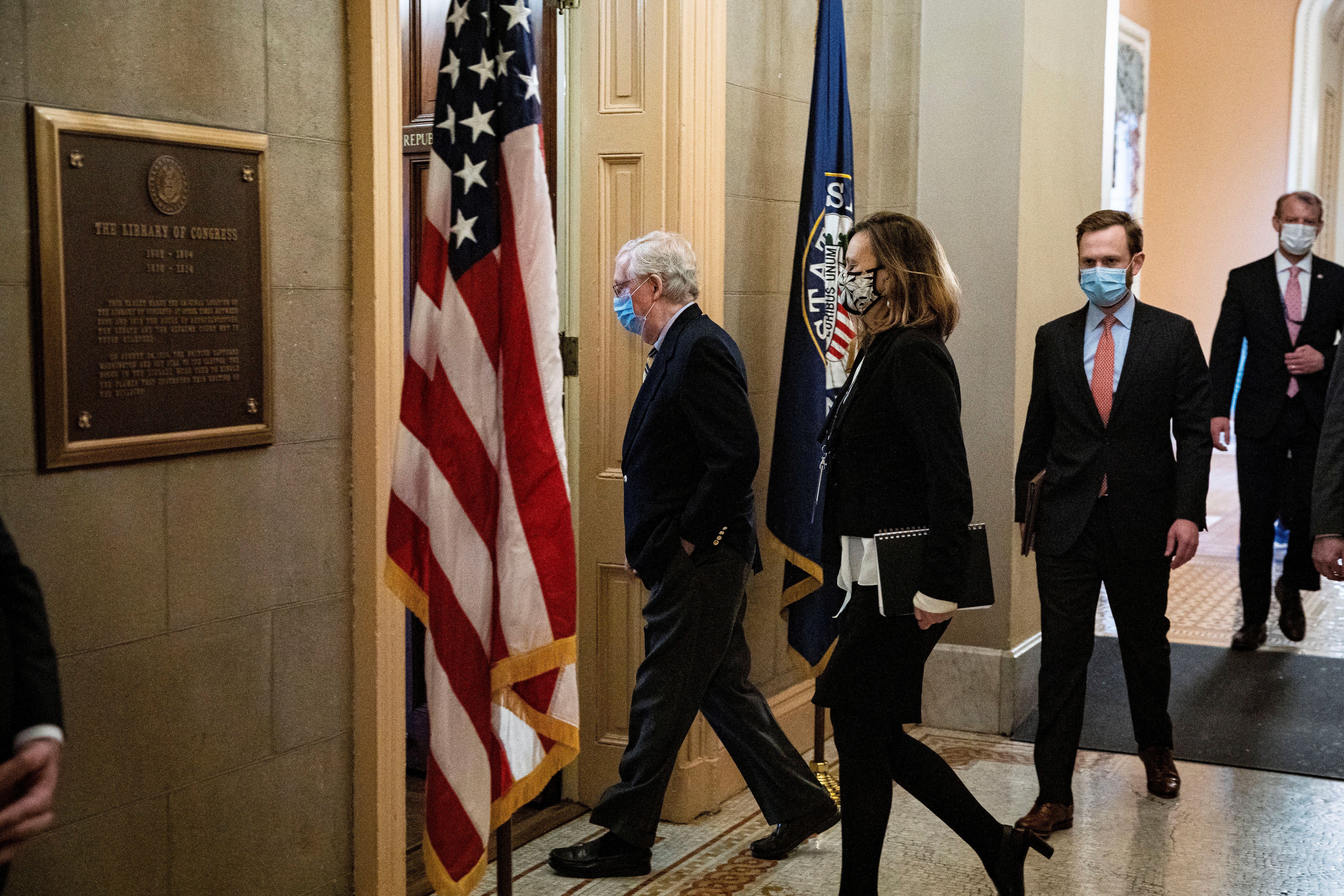 U.S. Senate Minority Leader McConnell (R-KY) arrives in his office after speaking on the Senate floor in the U.S. Capitol on the fifth day of the impeachment trial of former U.S. President Donald Trump