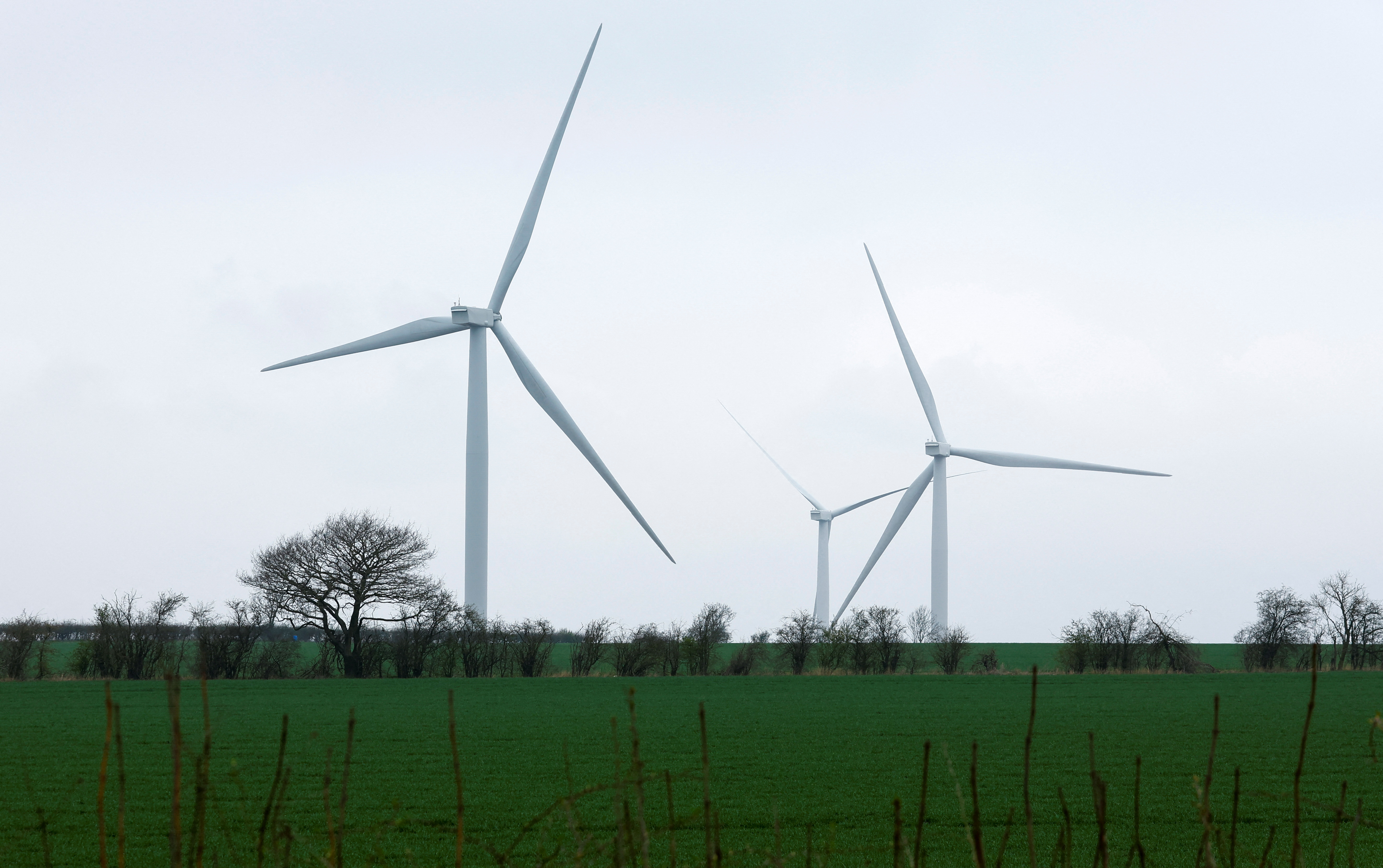 Wind turbines are seen in Finedon