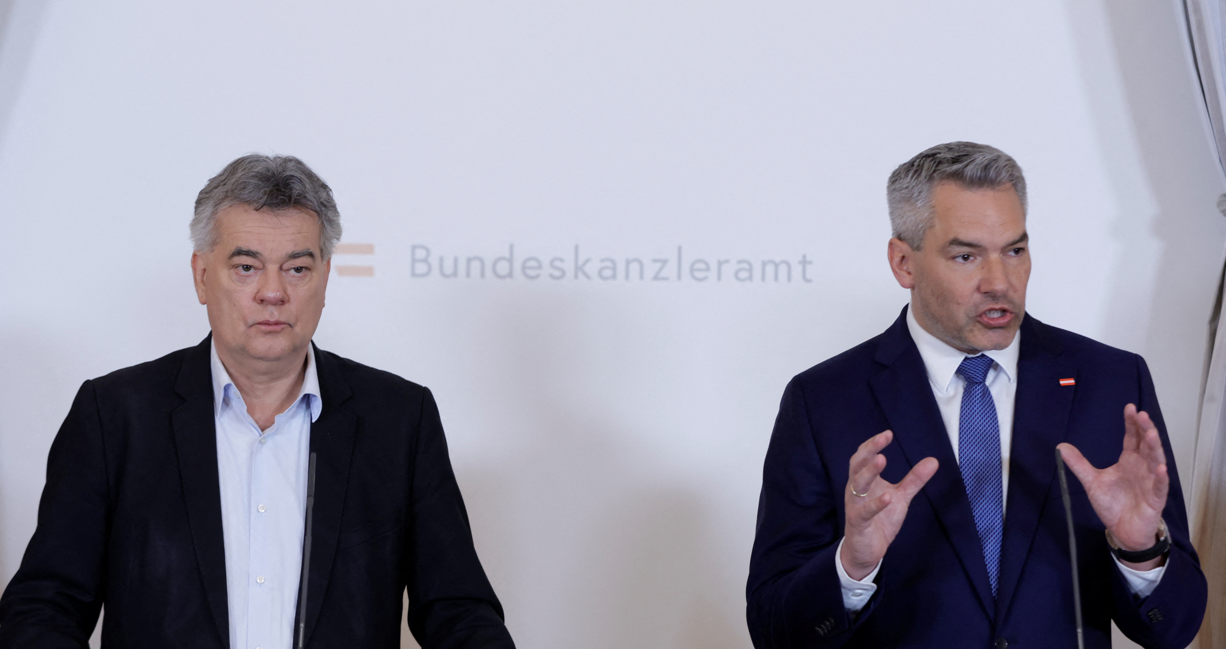 Austrian Chancellor Nehammer and Vice-Chancellor Kogler attend a news conference in Vienna