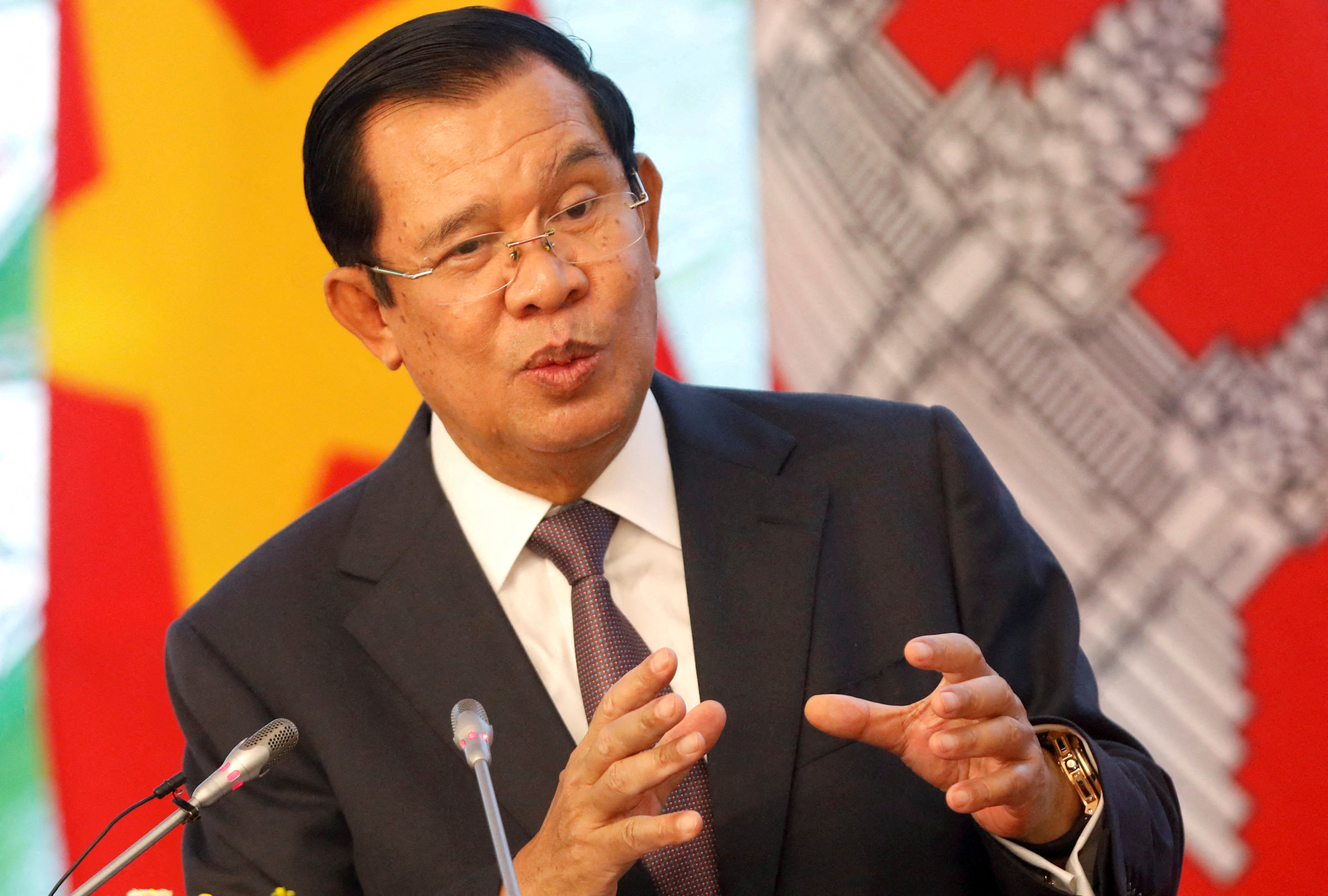 Cambodia's Prime Minister Hun Sen speaks with media during a news conference at the Government Office in Hanoi