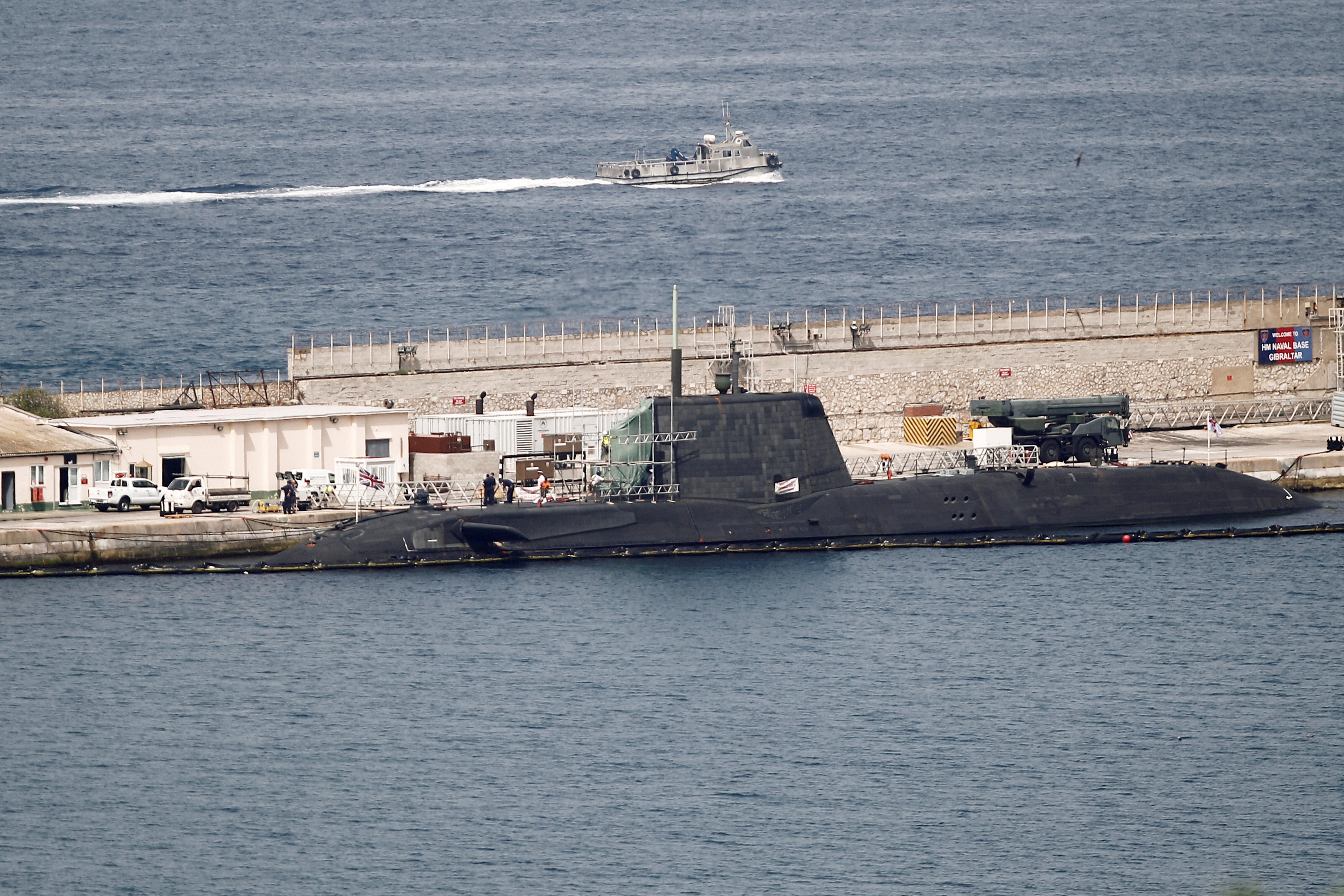 A British nuclear Astute-class submarine HMS Ambush is seen docked in a port while it is repaired in the British overseas territory of Gibraltar
