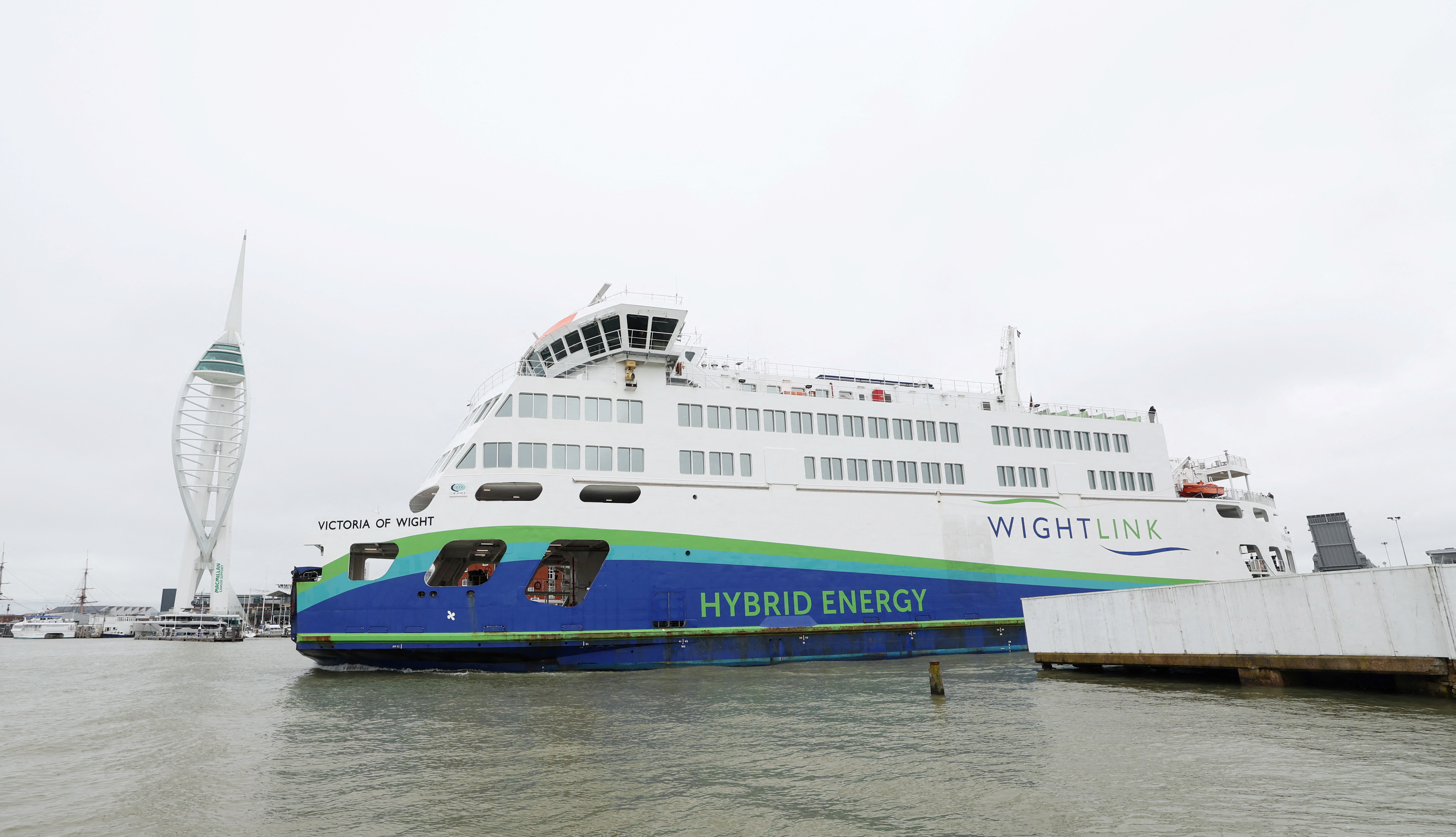 Wightlink's Victoria of Wight hybrid energy ferry passes by Spinnaker Tower just outside Portsmouth