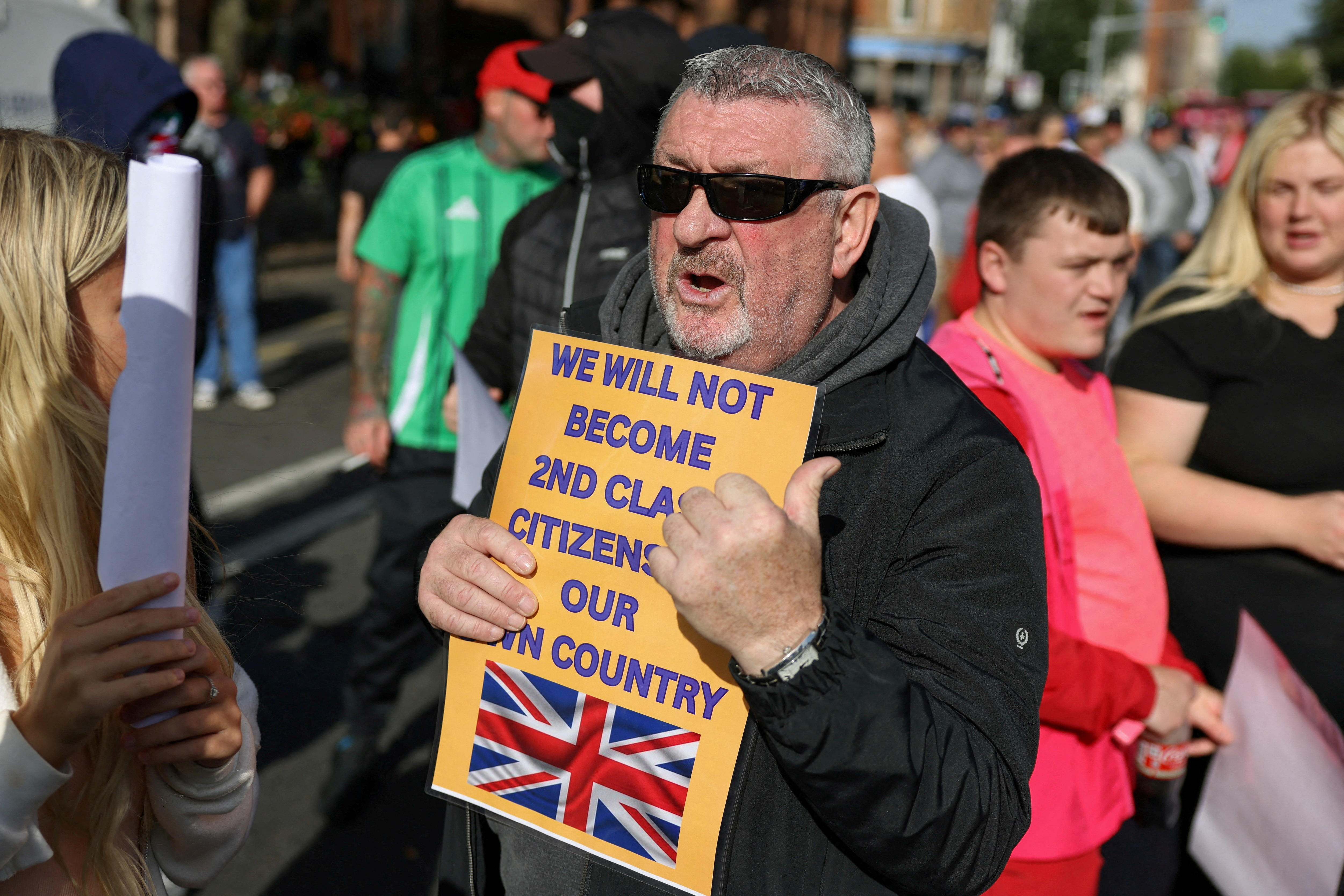 Protesters attend an anti-immigration protest in Belfast