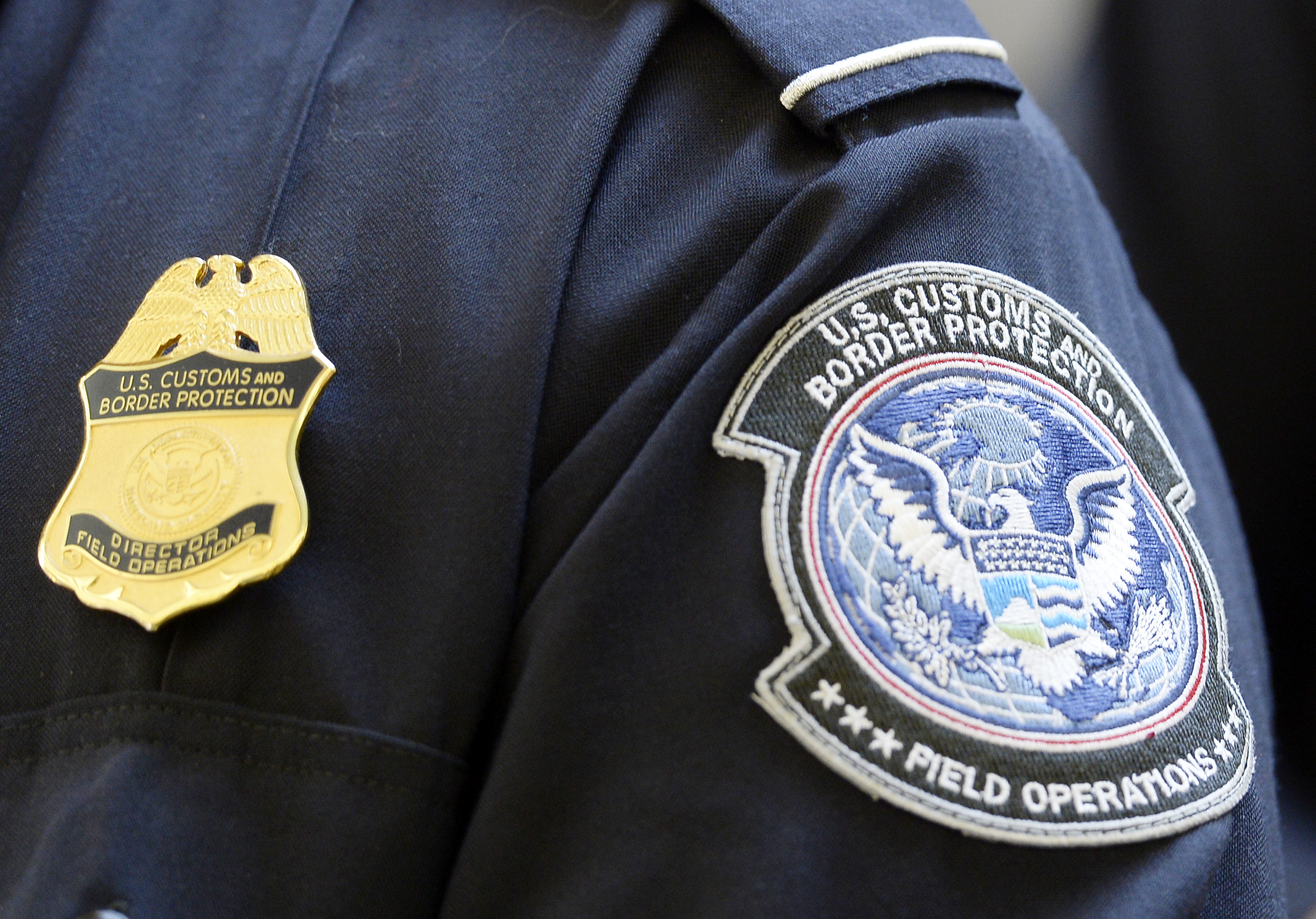 A U.S. Customs and Border Protection arm patch and badge is seen at Los Angeles International Airport
