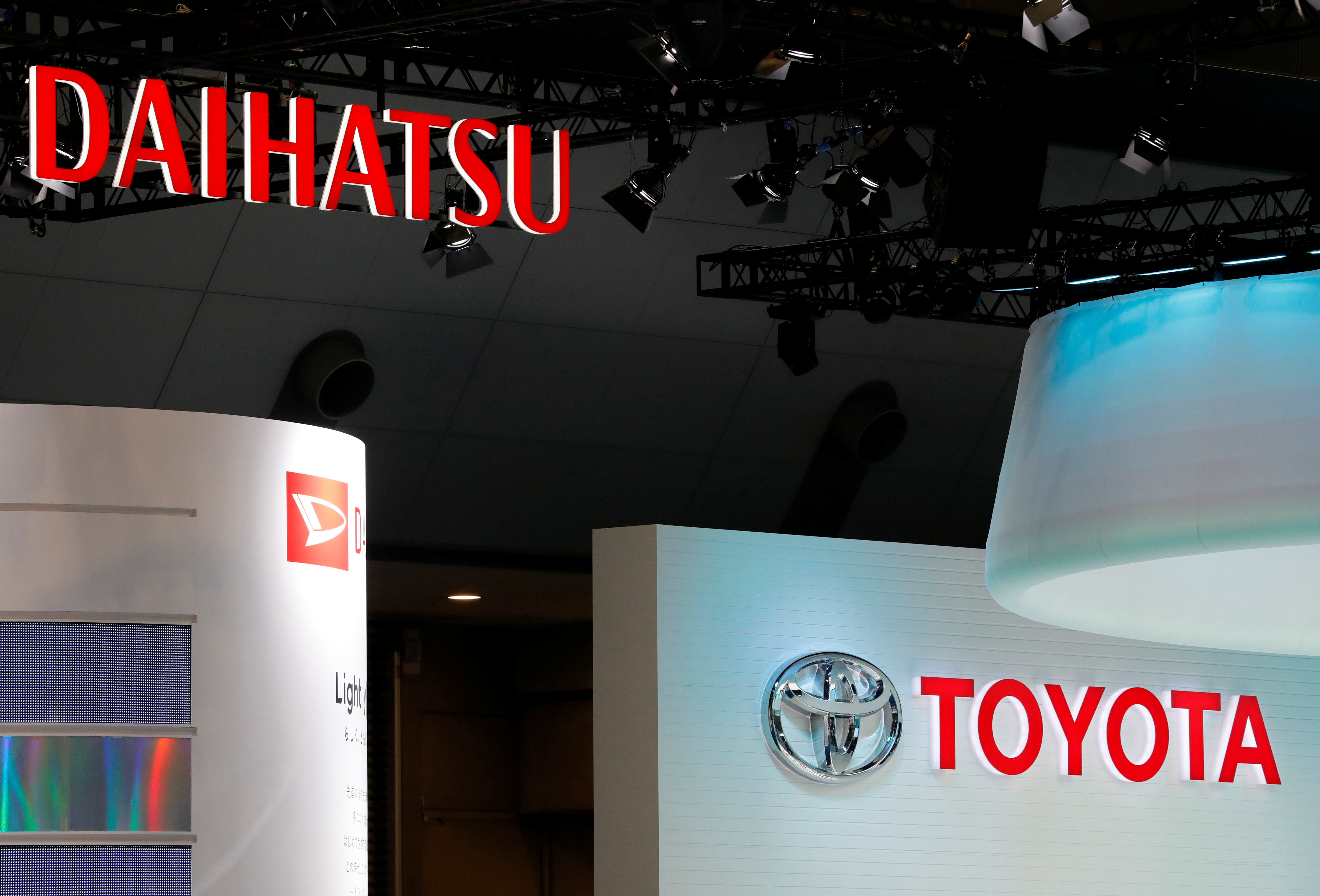 The logos of Daihatsu Motors and Toyota Motor are pictured at the 45th Tokyo Motor Show in Tokyo