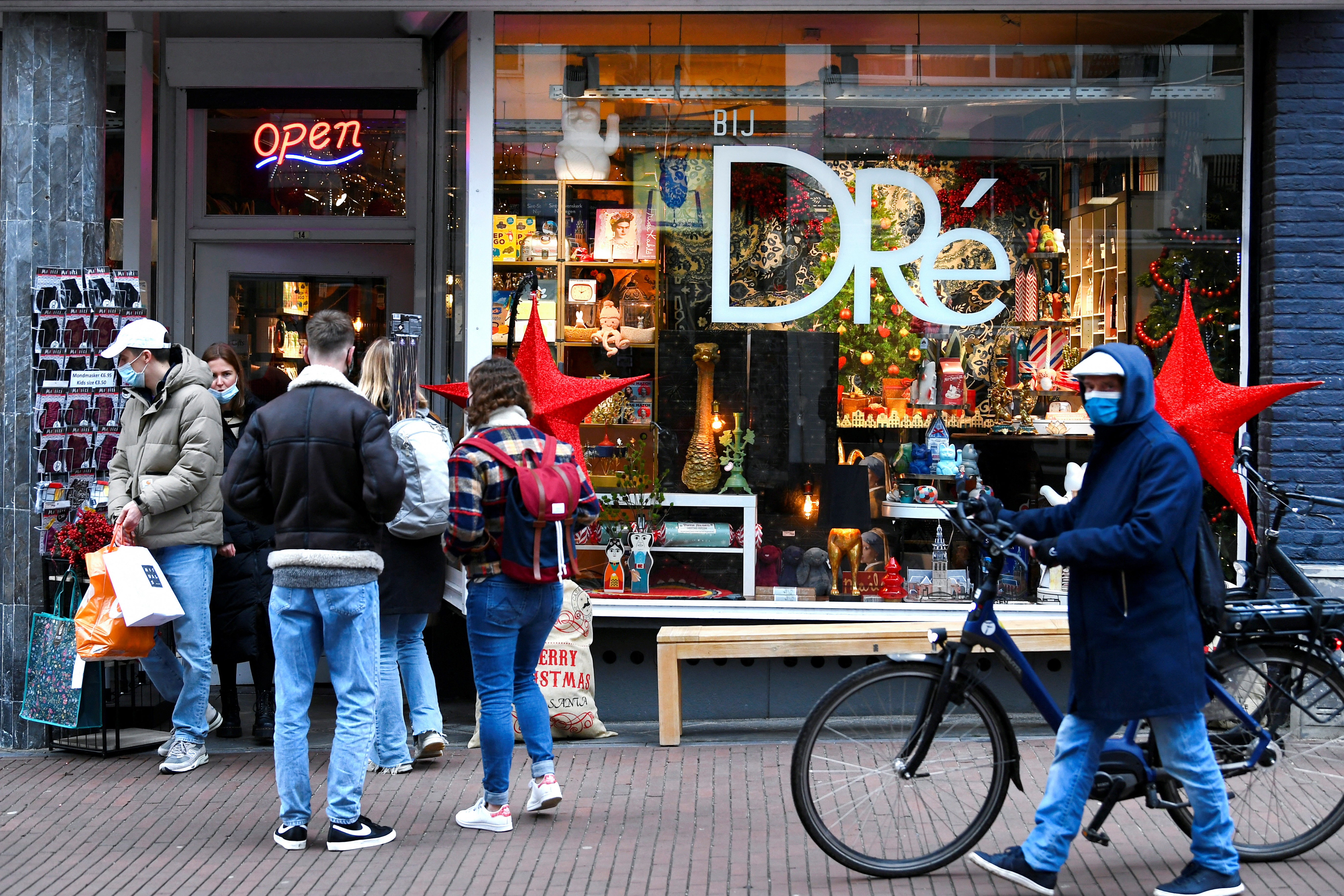 People do their Christmas shopping before the Netherlands go into "strict" Christmas lockdown, in Nijmegen