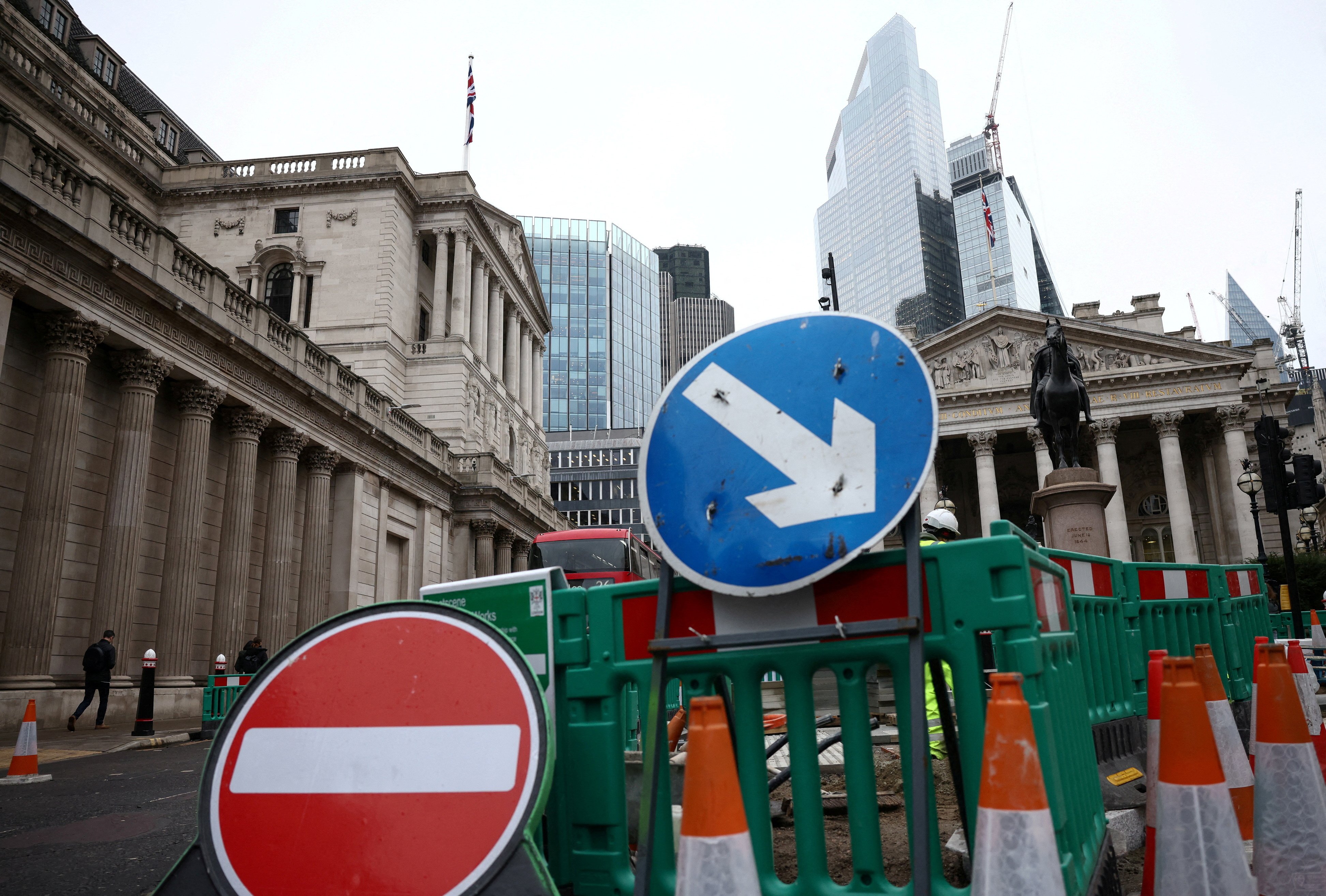 Road construction signage outside the Bank of England in the City of London financial district, in London