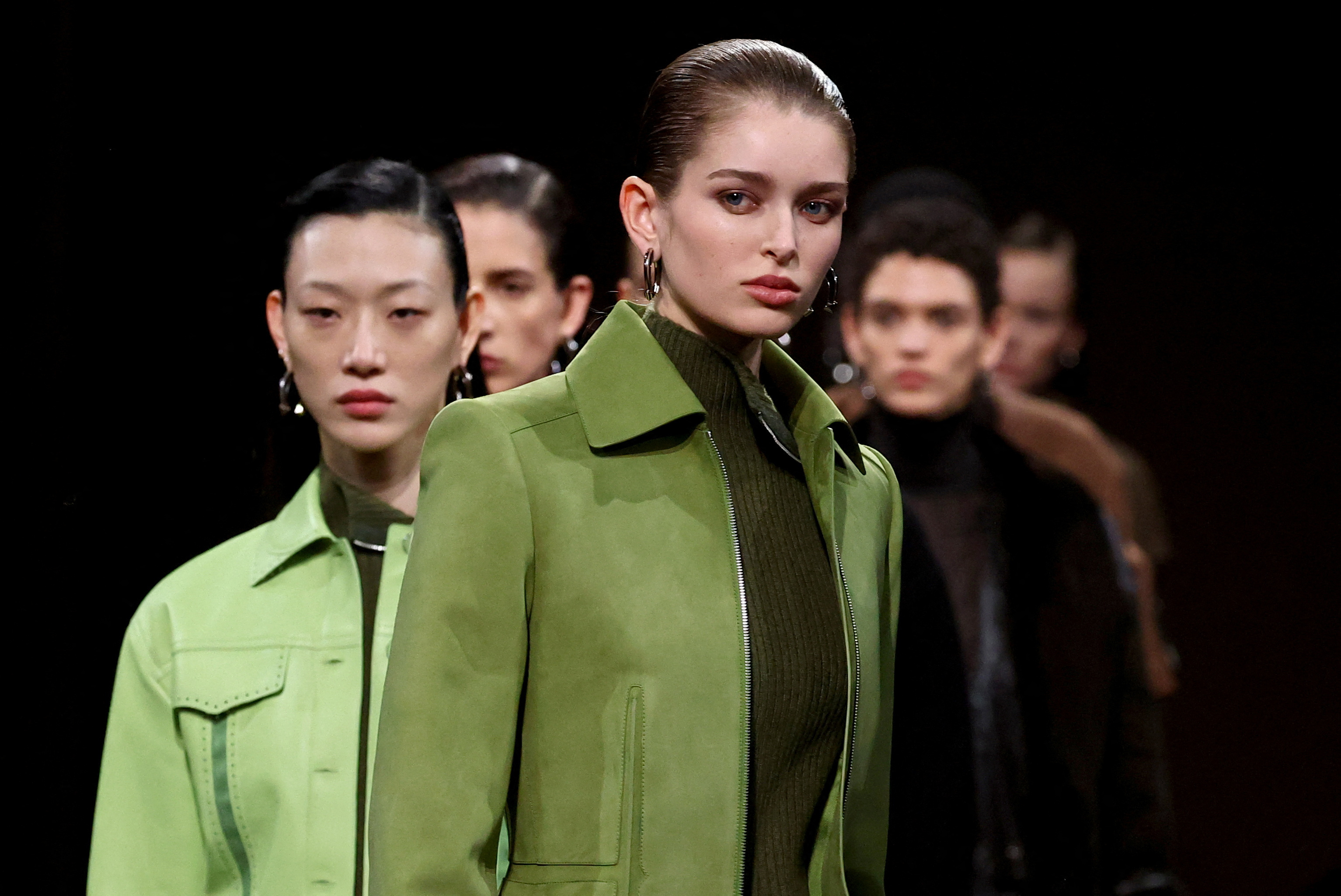 Hermes shows slick leather ensembles on dirt runway at Paris