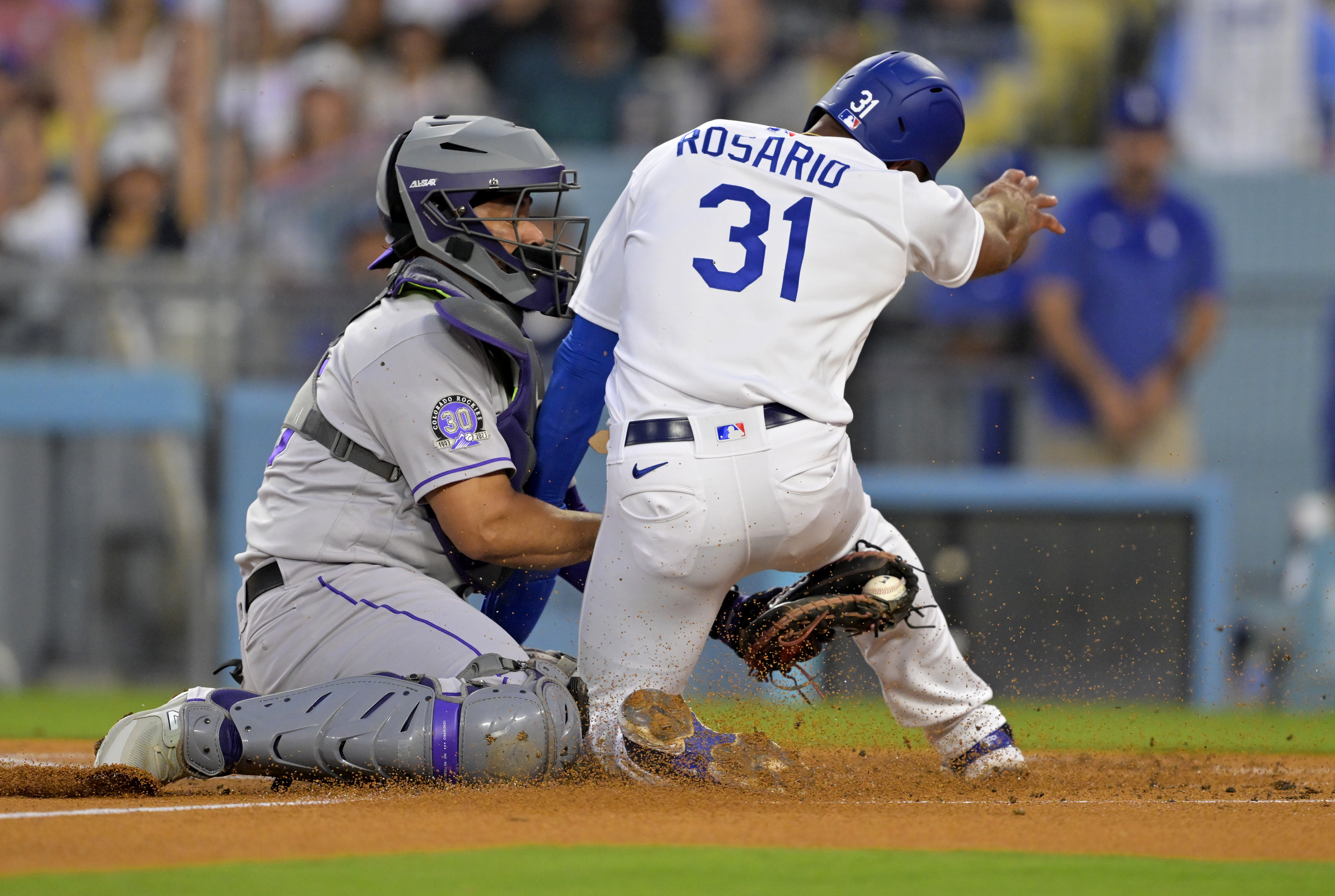 Dodgers beat Rockies 2-1 on Betts' infield single in 9th